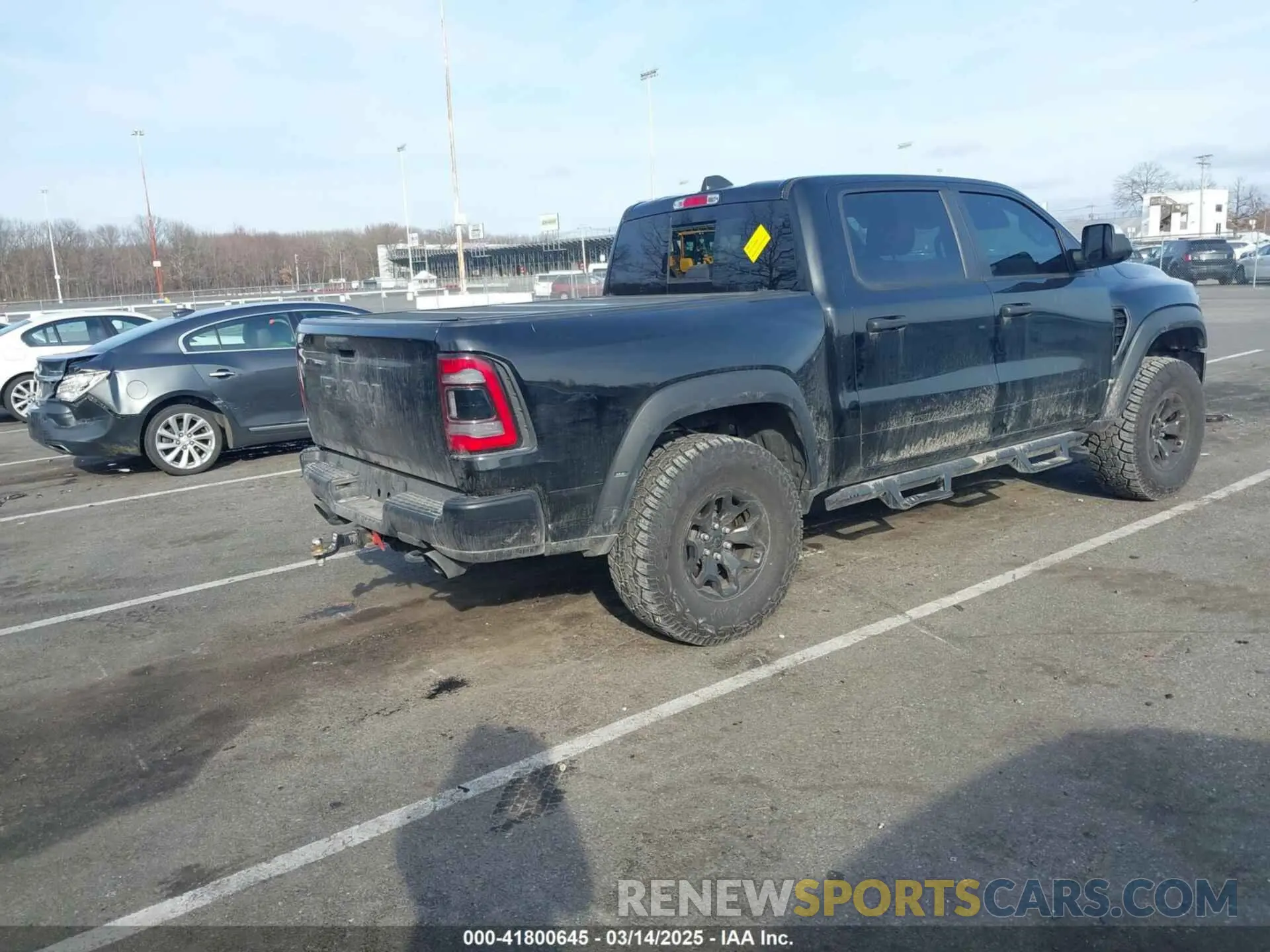 4 Photograph of a damaged car 1C6SRFU92MN903941 RAM 1500 2021
