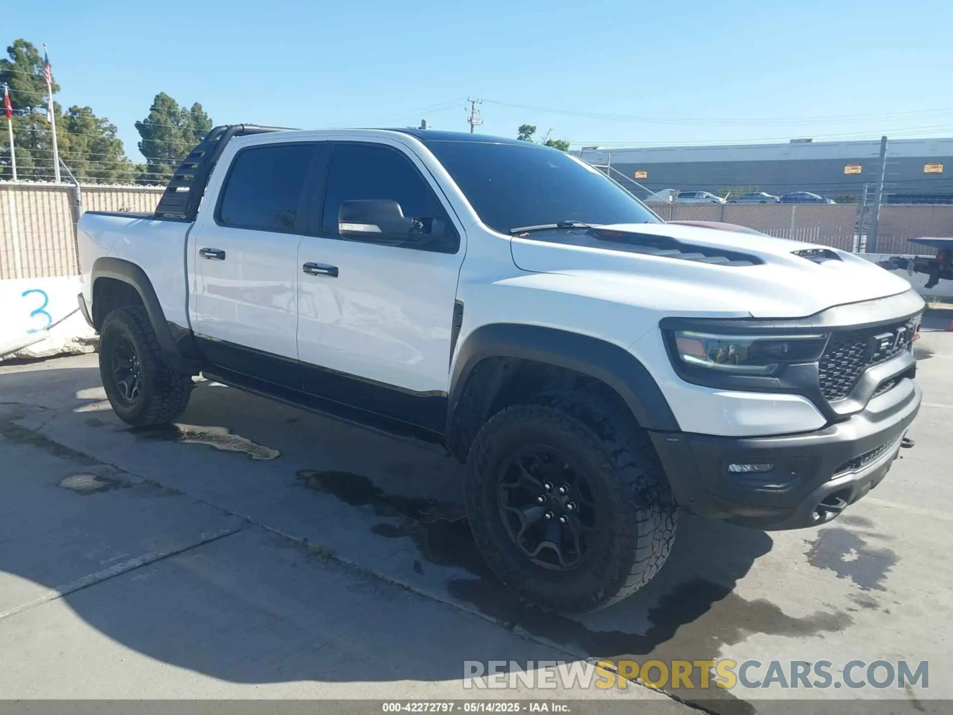 1 Photograph of a damaged car 1C6SRFU93MN685217 RAM 1500 2021