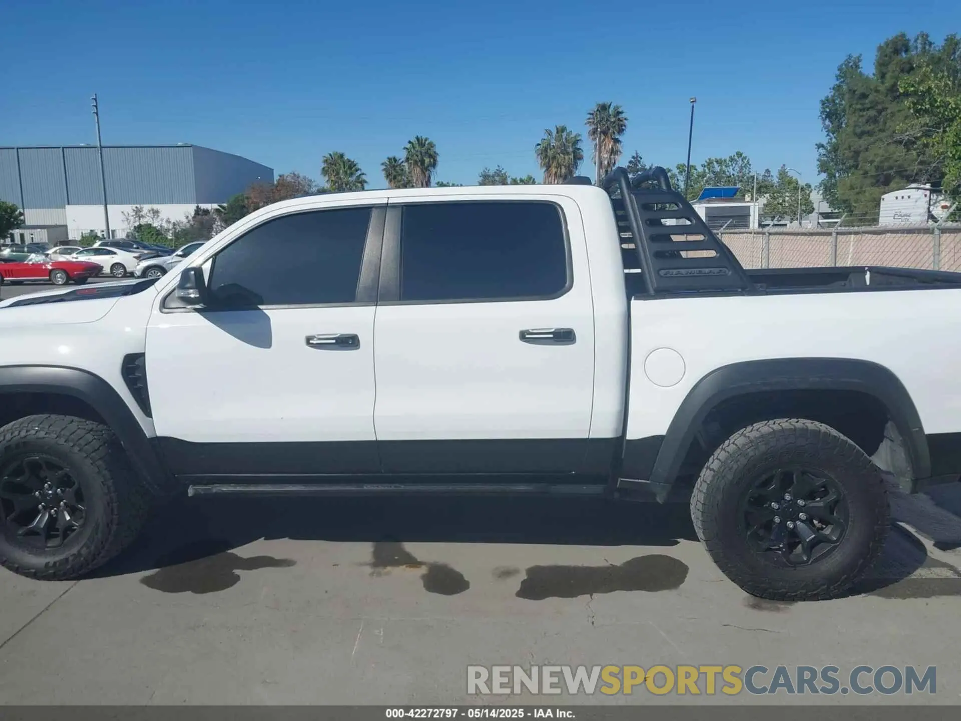 14 Photograph of a damaged car 1C6SRFU93MN685217 RAM 1500 2021