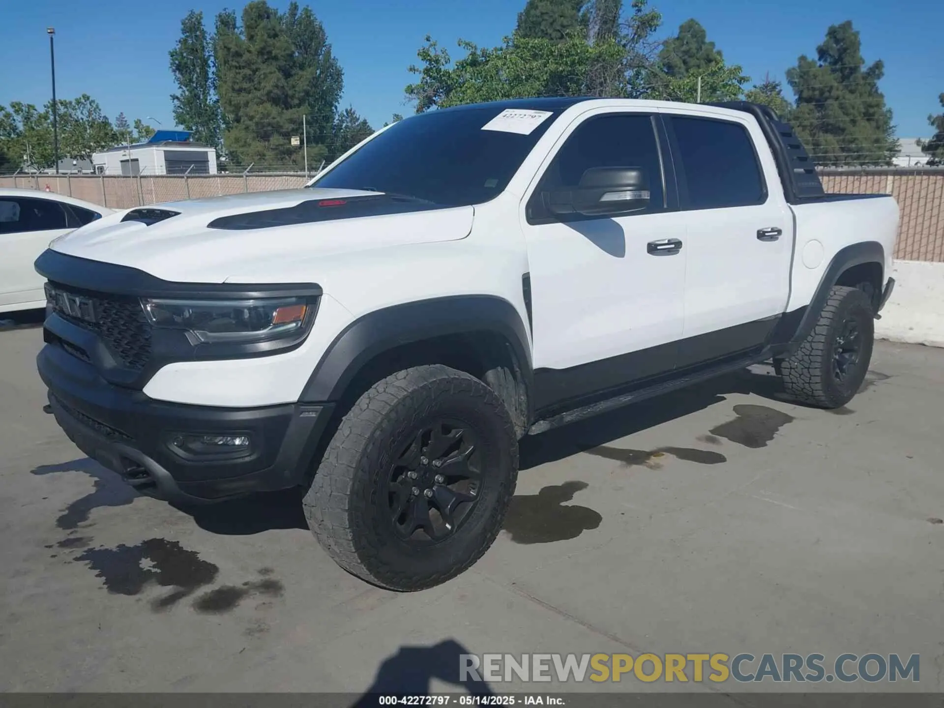 2 Photograph of a damaged car 1C6SRFU93MN685217 RAM 1500 2021