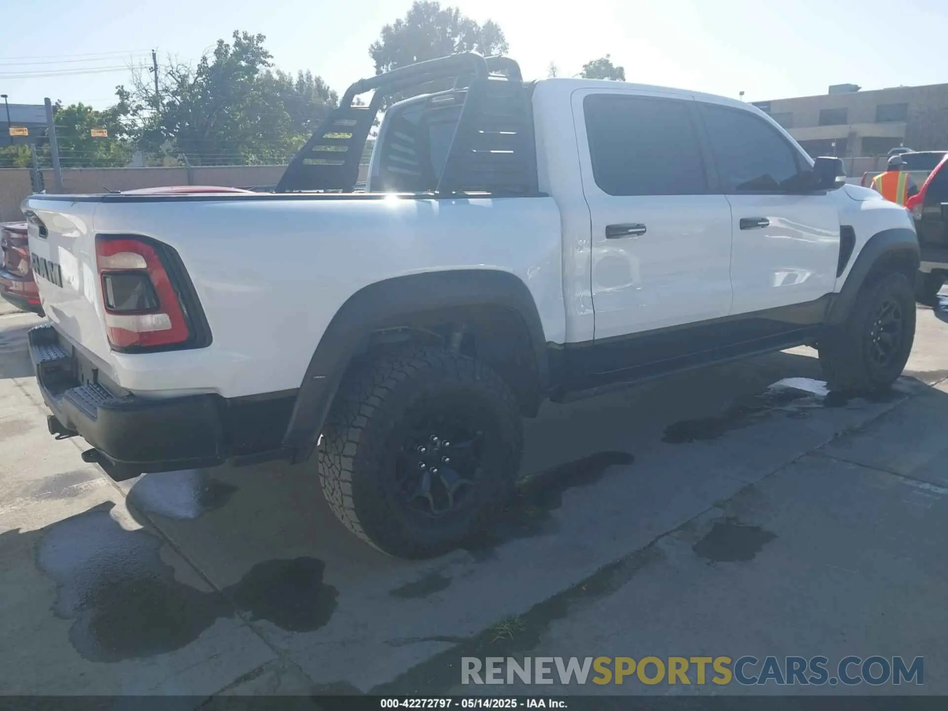 4 Photograph of a damaged car 1C6SRFU93MN685217 RAM 1500 2021