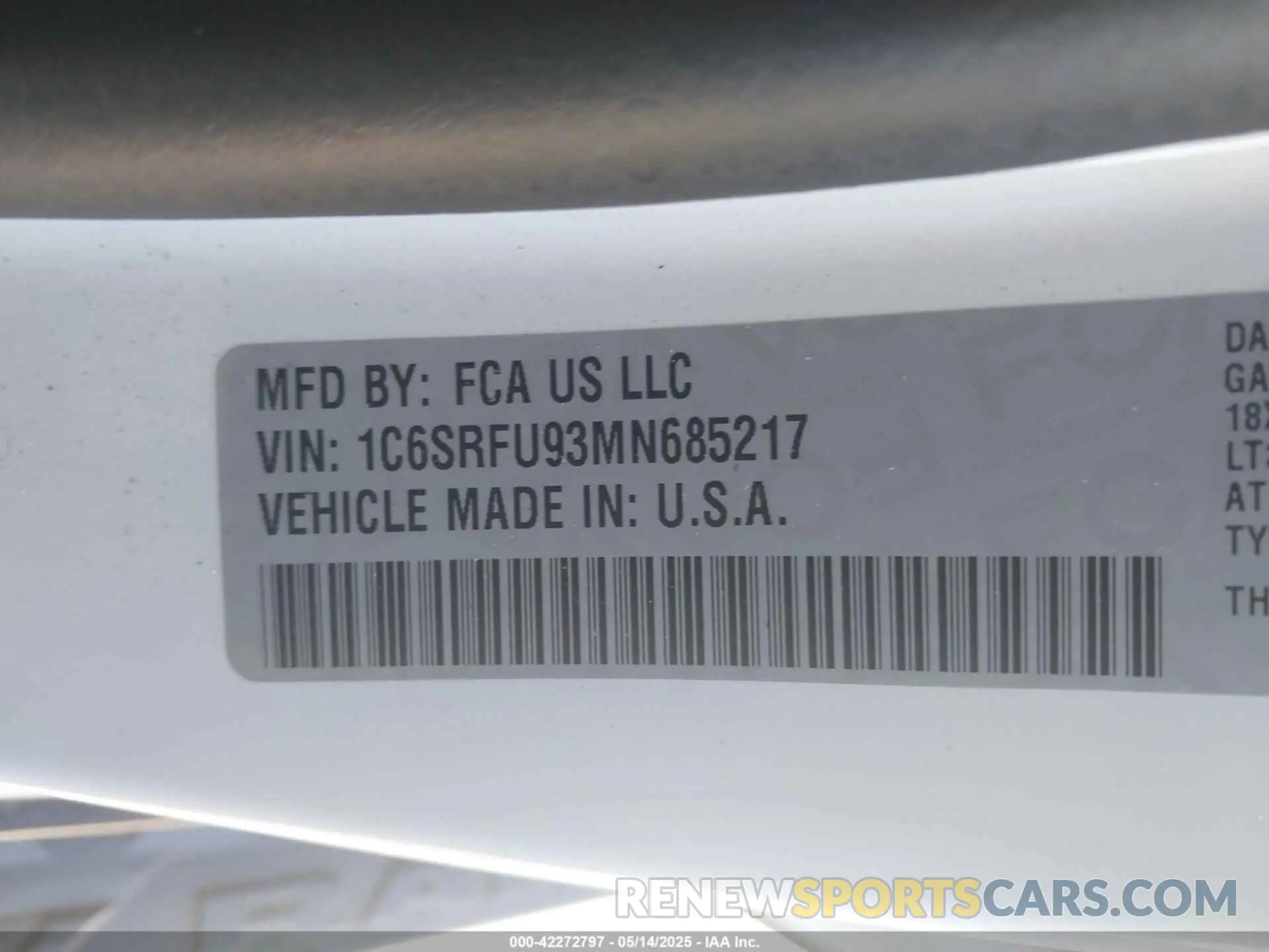 9 Photograph of a damaged car 1C6SRFU93MN685217 RAM 1500 2021