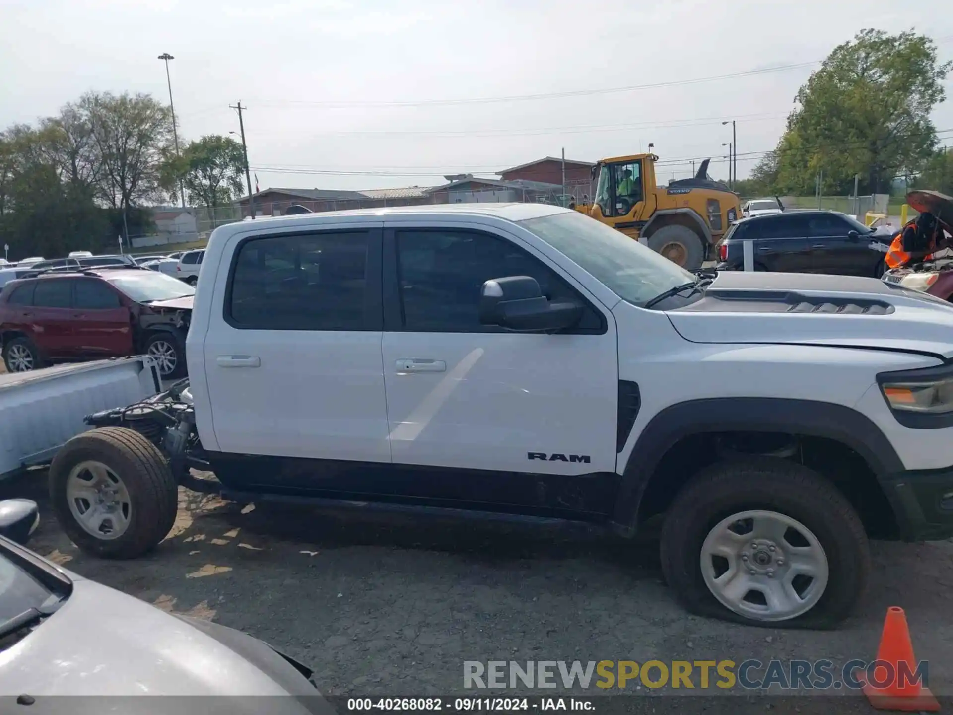 14 Photograph of a damaged car 1C6SRFU93MN699456 RAM 1500 2021