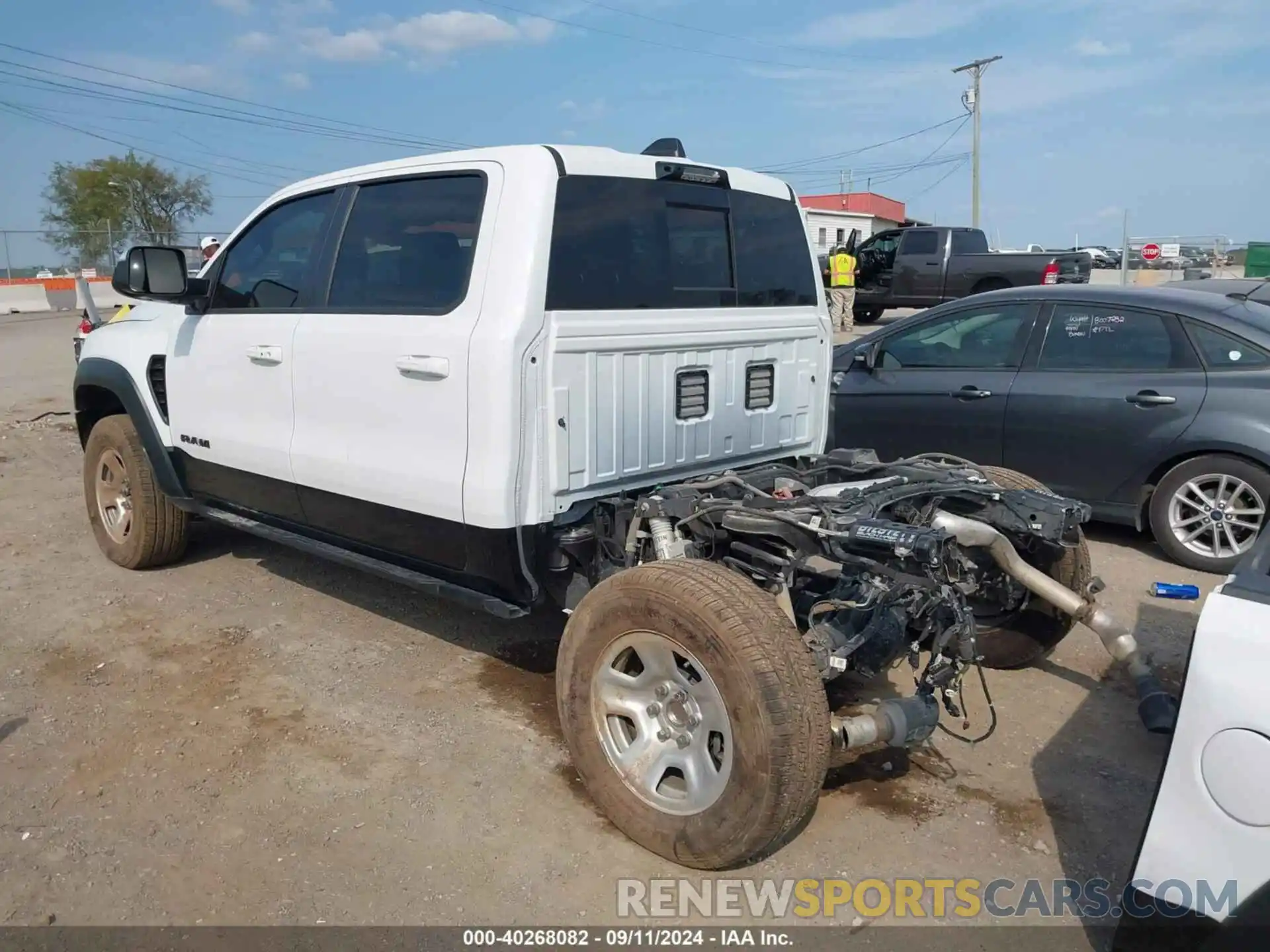 3 Photograph of a damaged car 1C6SRFU93MN699456 RAM 1500 2021