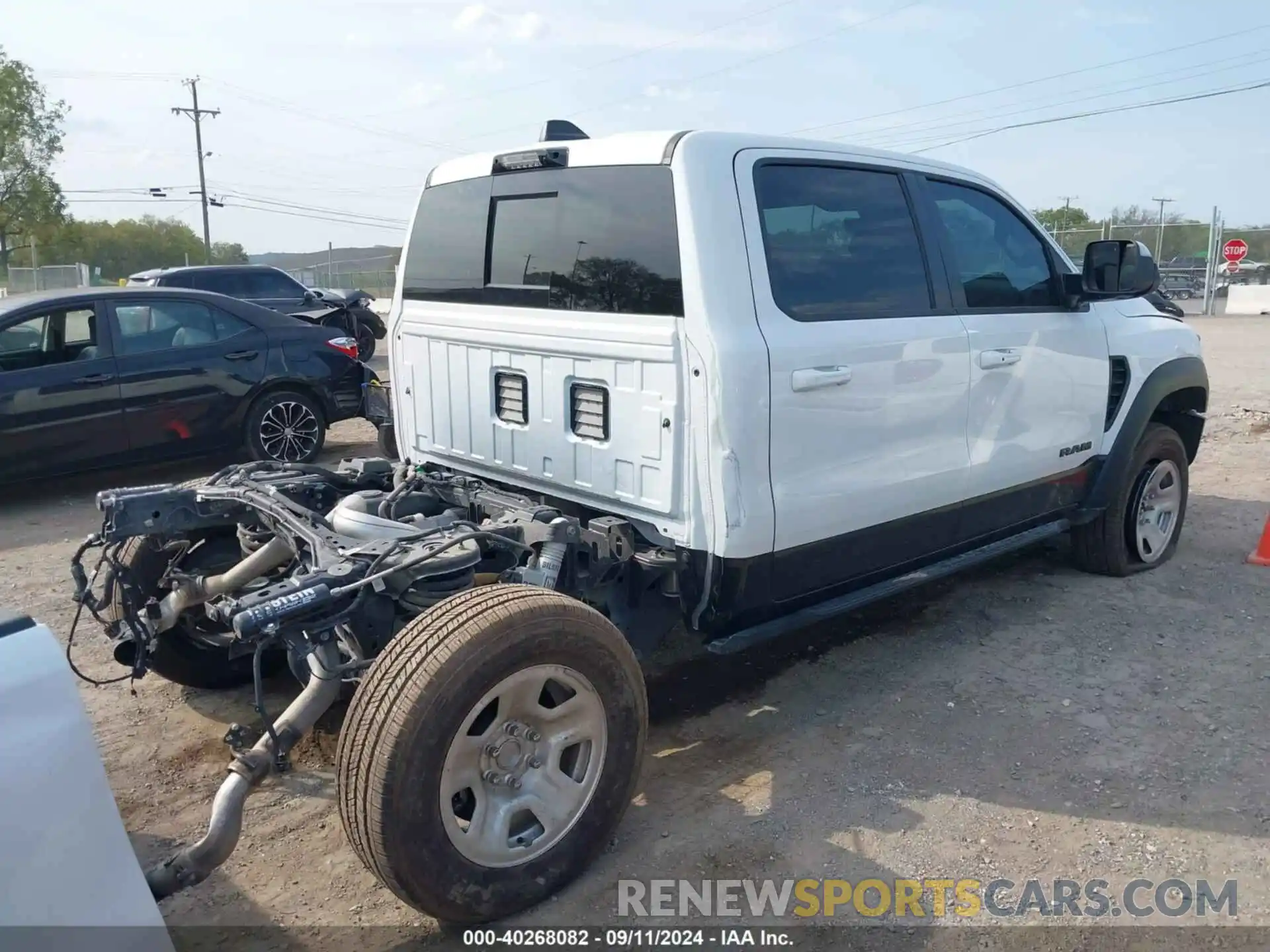 4 Photograph of a damaged car 1C6SRFU93MN699456 RAM 1500 2021