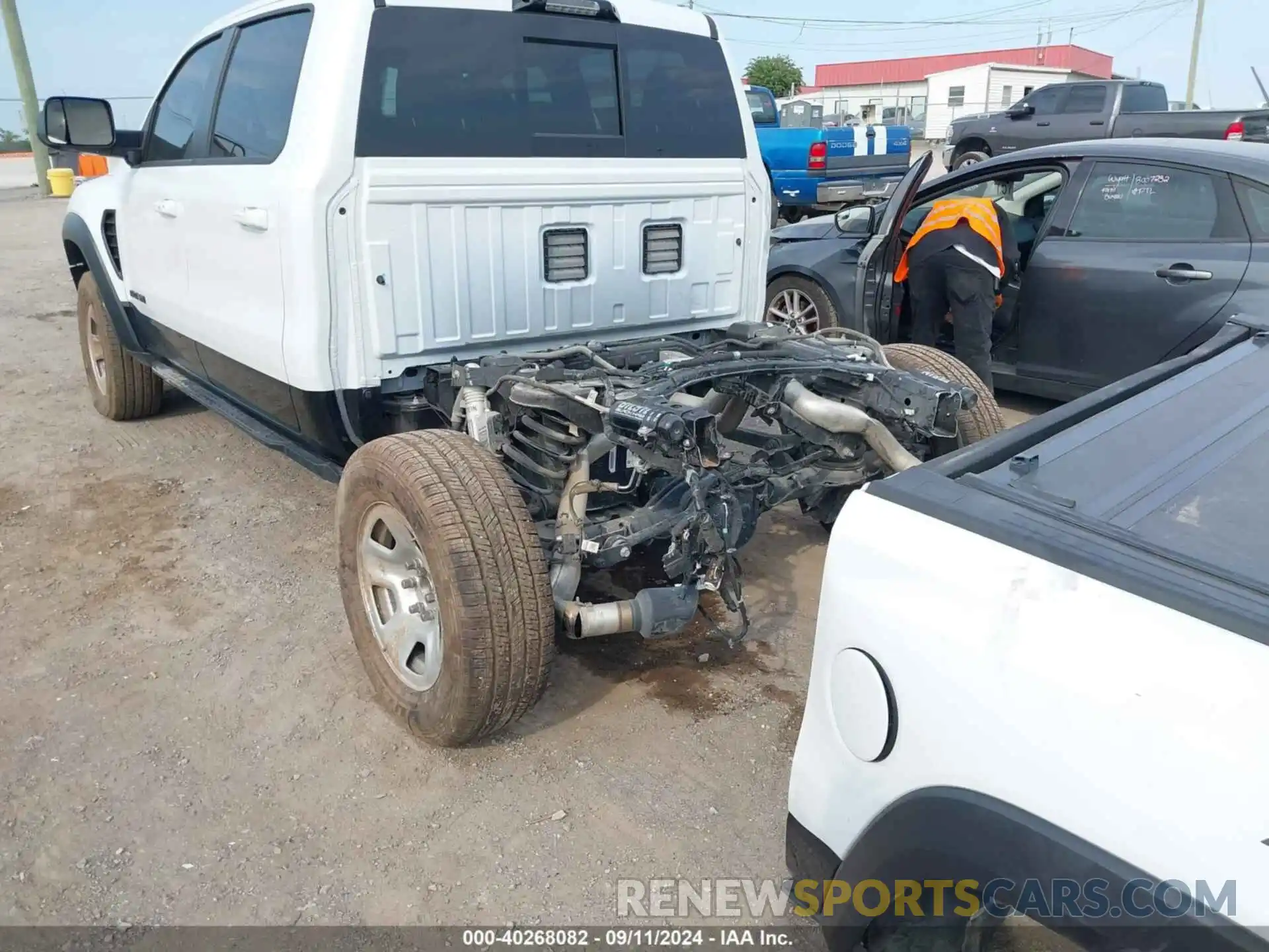 6 Photograph of a damaged car 1C6SRFU93MN699456 RAM 1500 2021