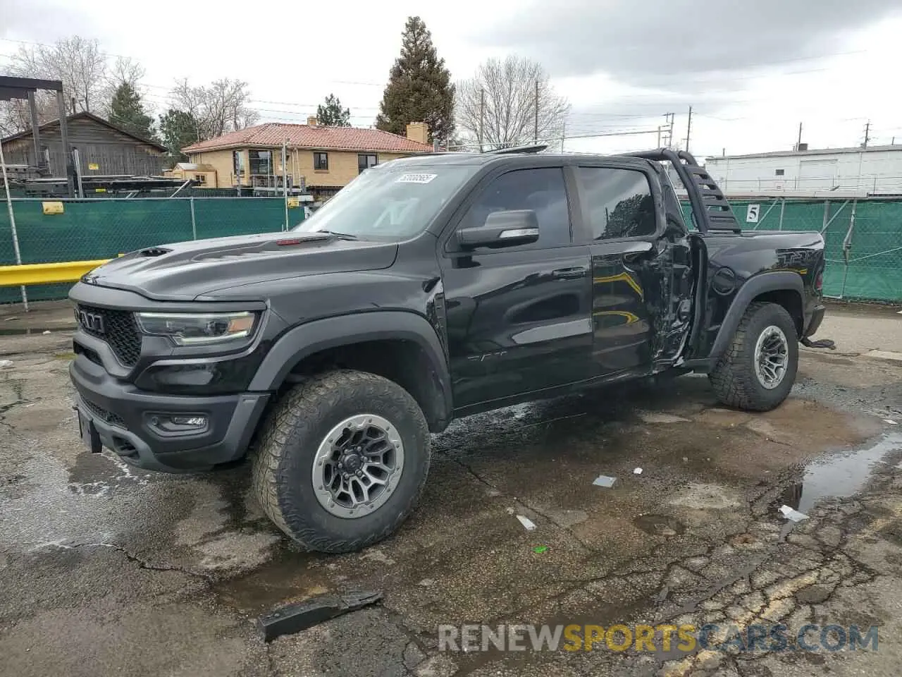 1 Photograph of a damaged car 1C6SRFU93MN719060 RAM 1500 2021