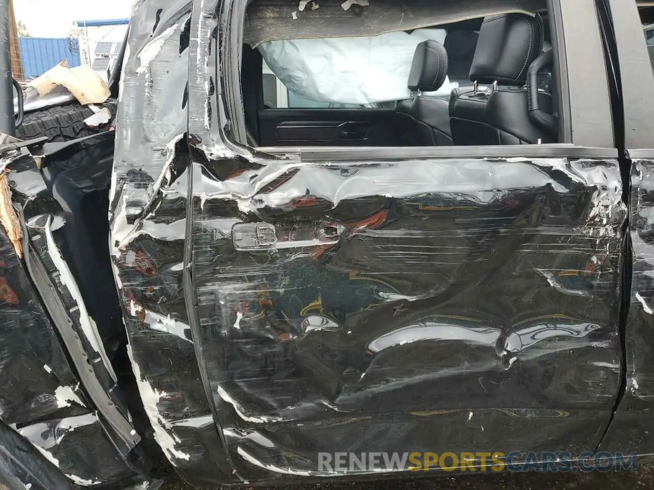 10 Photograph of a damaged car 1C6SRFU93MN719060 RAM 1500 2021