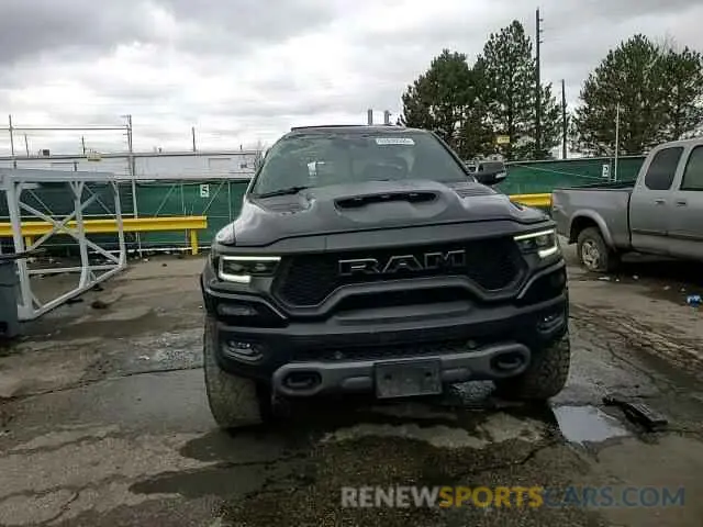 11 Photograph of a damaged car 1C6SRFU93MN719060 RAM 1500 2021
