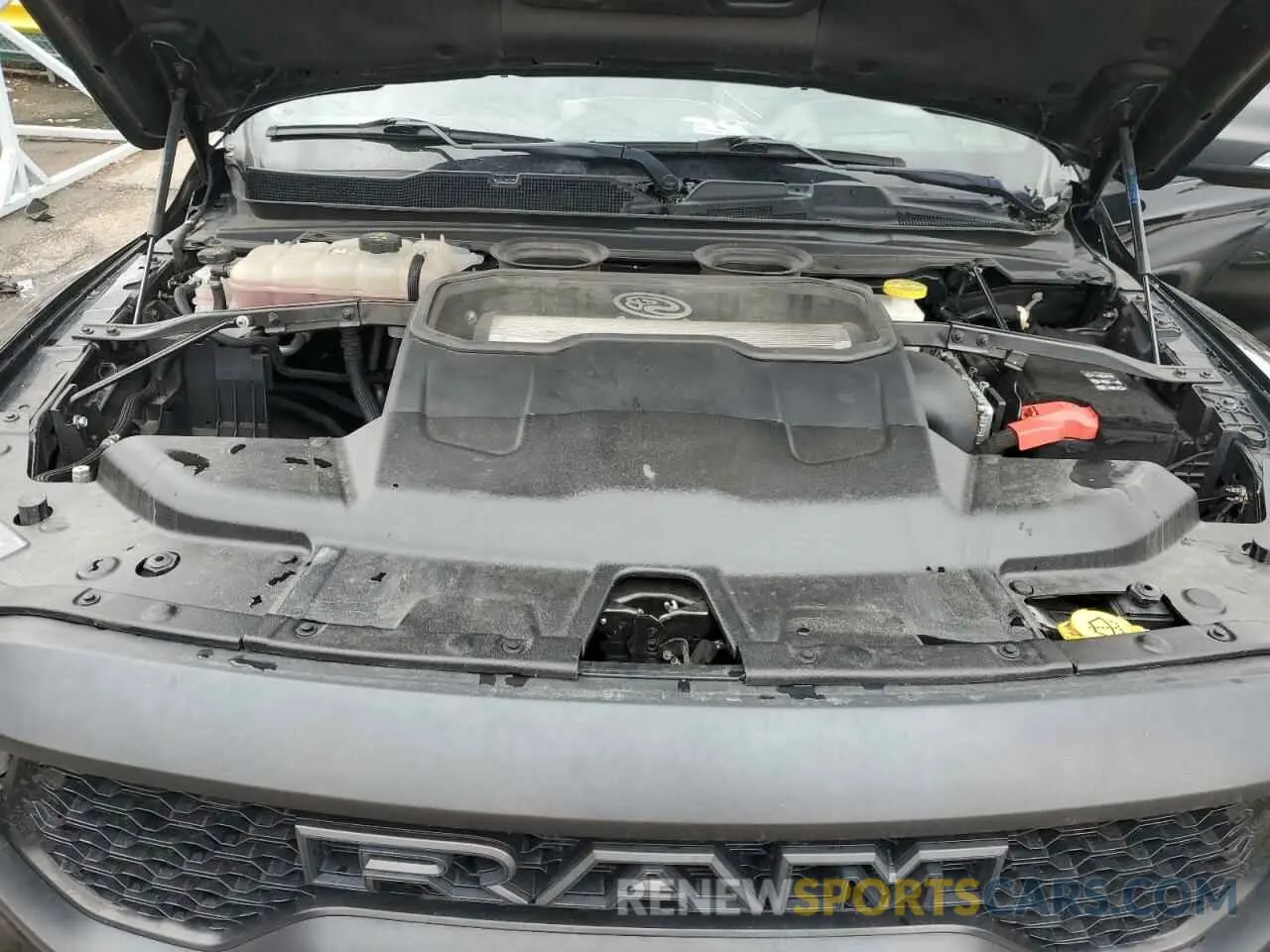 12 Photograph of a damaged car 1C6SRFU93MN719060 RAM 1500 2021