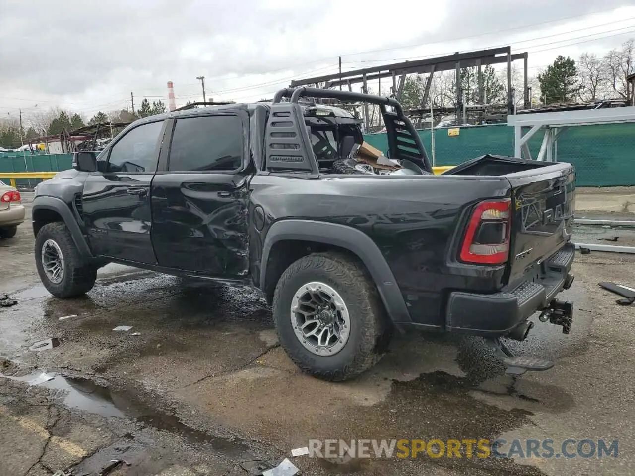 2 Photograph of a damaged car 1C6SRFU93MN719060 RAM 1500 2021