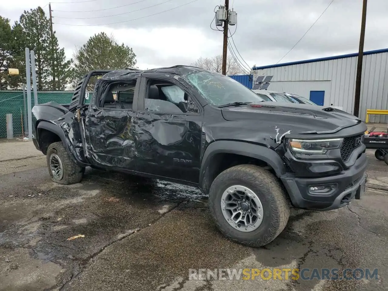 4 Photograph of a damaged car 1C6SRFU93MN719060 RAM 1500 2021