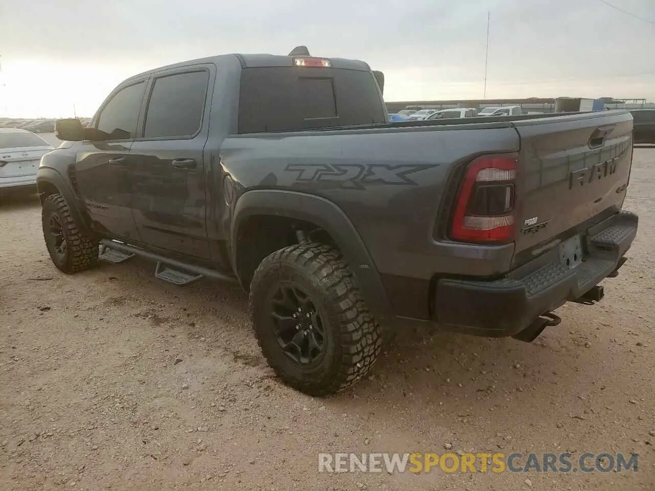 2 Photograph of a damaged car 1C6SRFU93MN760689 RAM 1500 2021