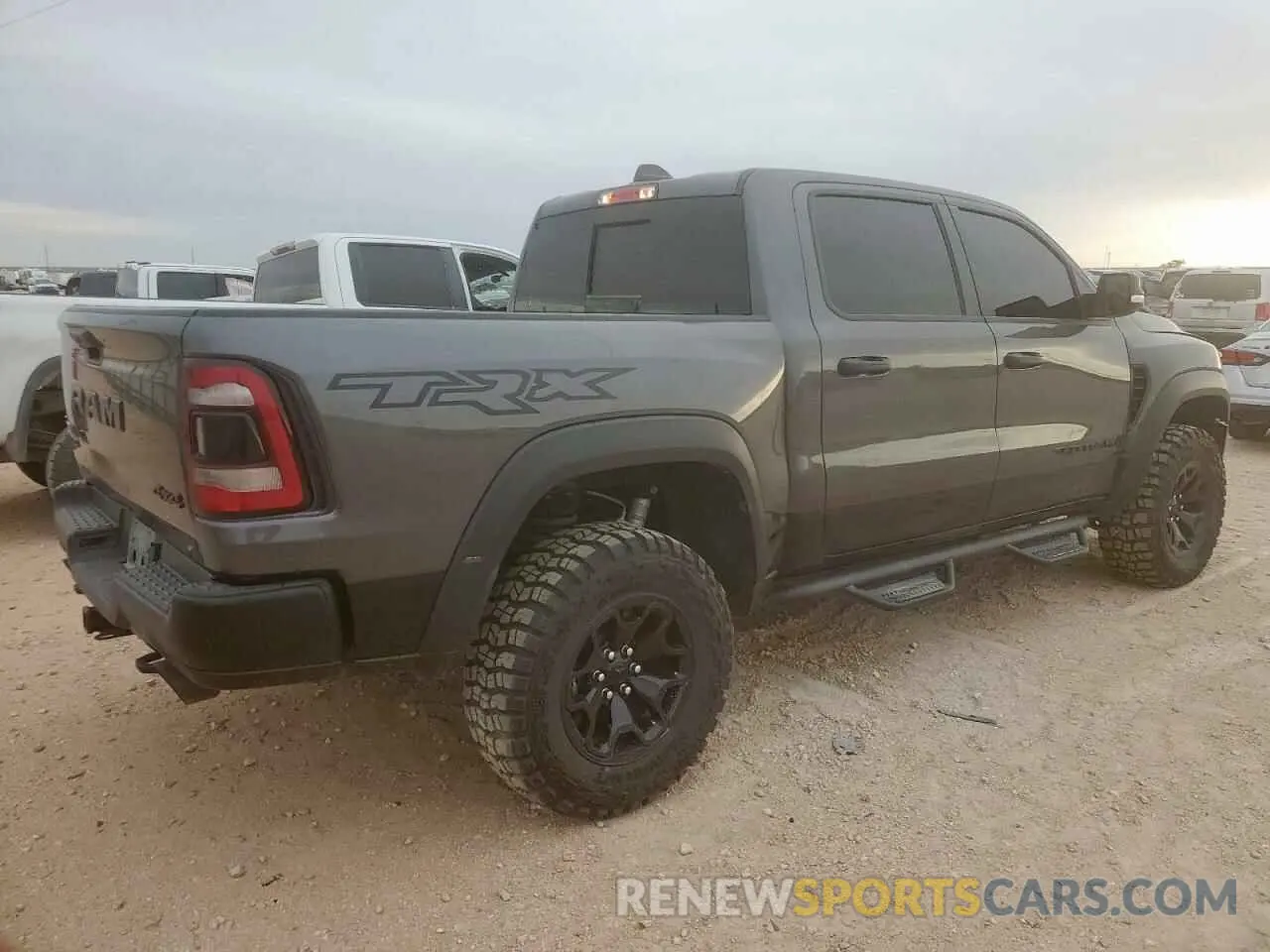 3 Photograph of a damaged car 1C6SRFU93MN760689 RAM 1500 2021