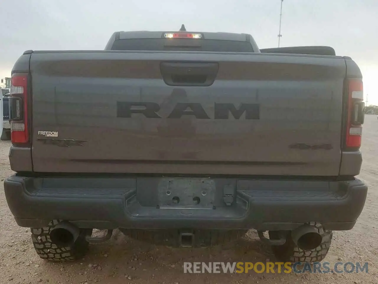 6 Photograph of a damaged car 1C6SRFU93MN760689 RAM 1500 2021
