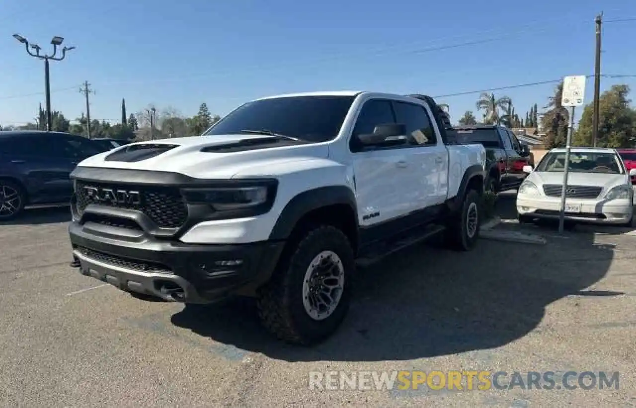 2 Photograph of a damaged car 1C6SRFU93MN903804 RAM 1500 2021