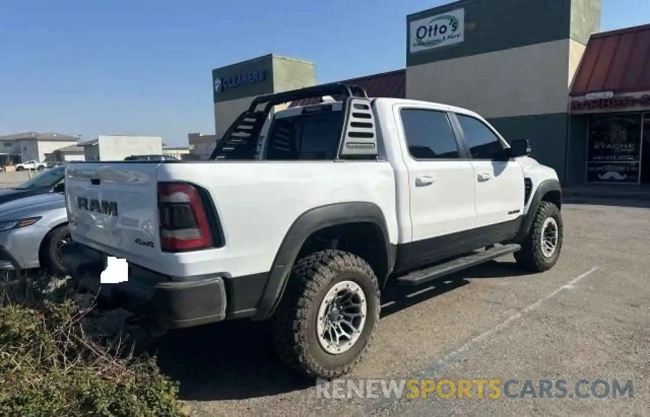 4 Photograph of a damaged car 1C6SRFU93MN903804 RAM 1500 2021