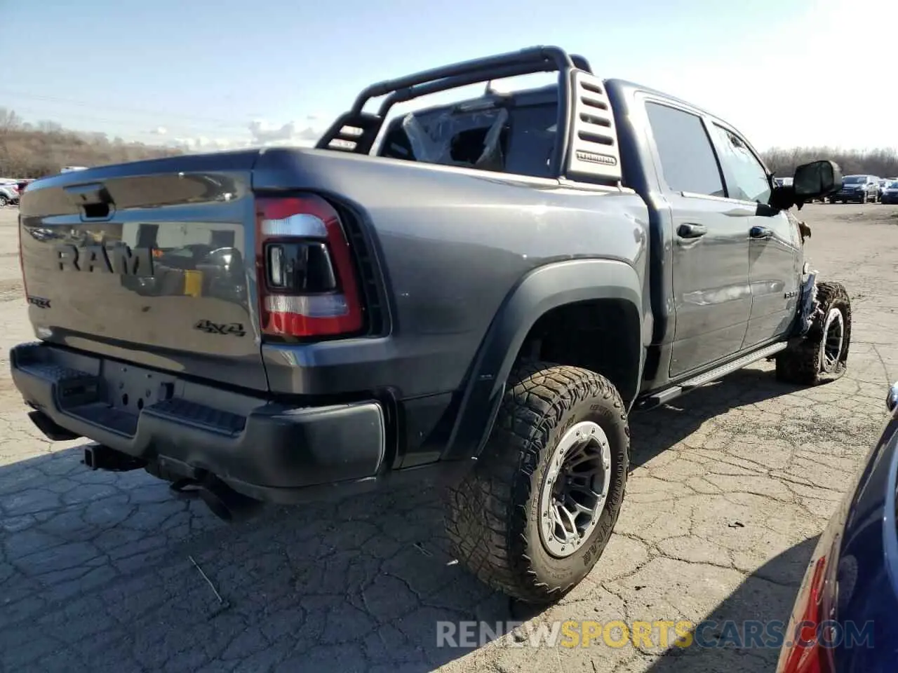 3 Photograph of a damaged car 1C6SRFU94MN684724 RAM 1500 2021