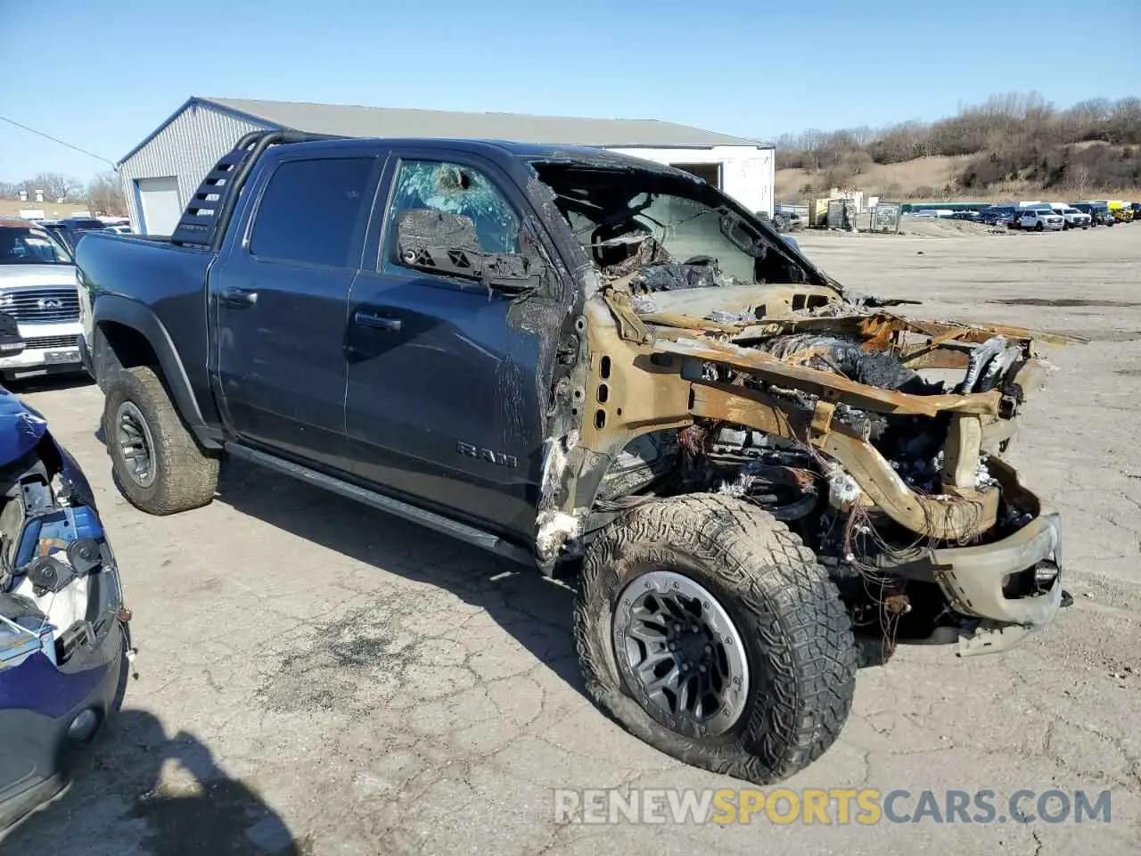 4 Photograph of a damaged car 1C6SRFU94MN684724 RAM 1500 2021