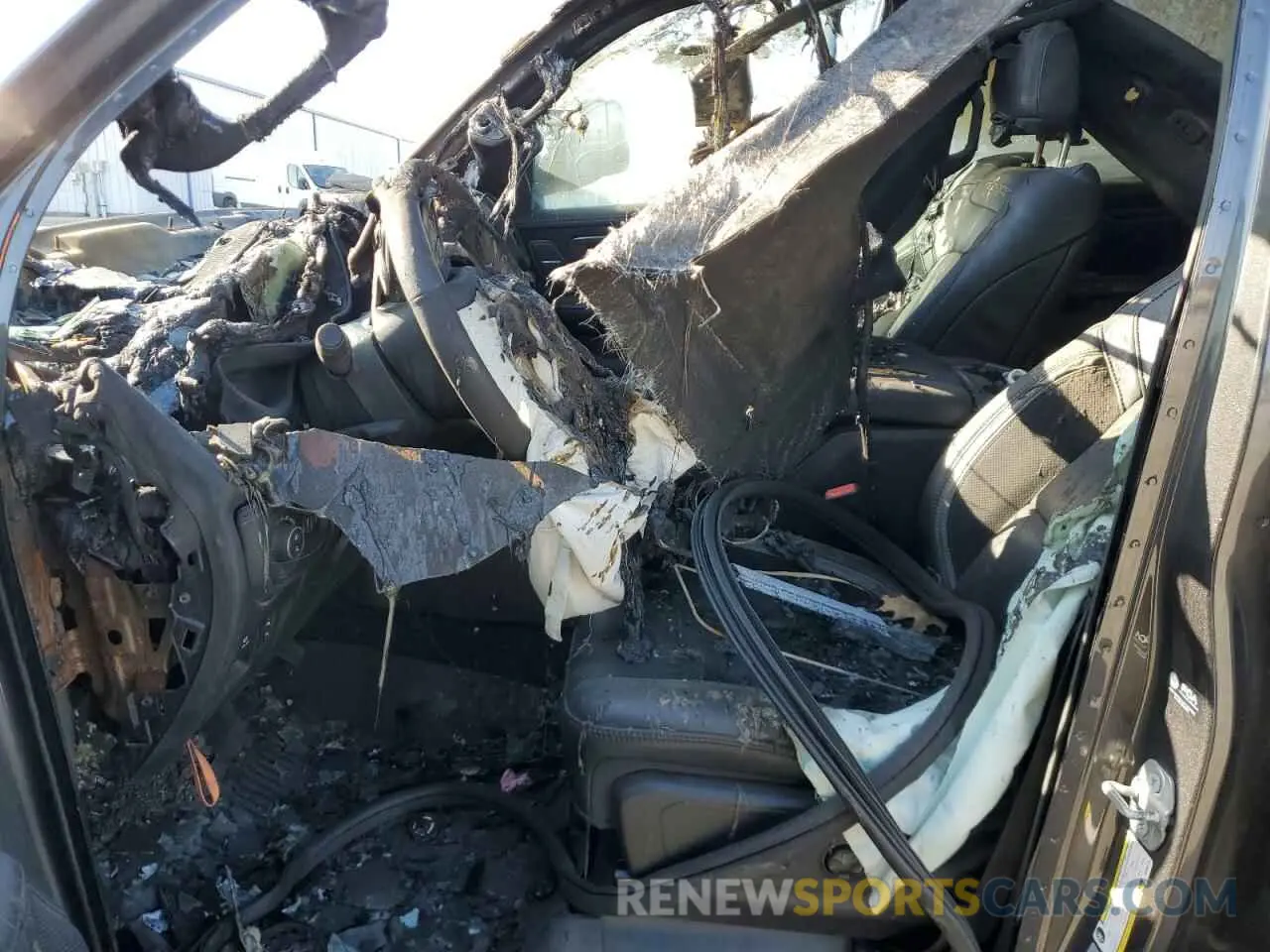 7 Photograph of a damaged car 1C6SRFU94MN684724 RAM 1500 2021