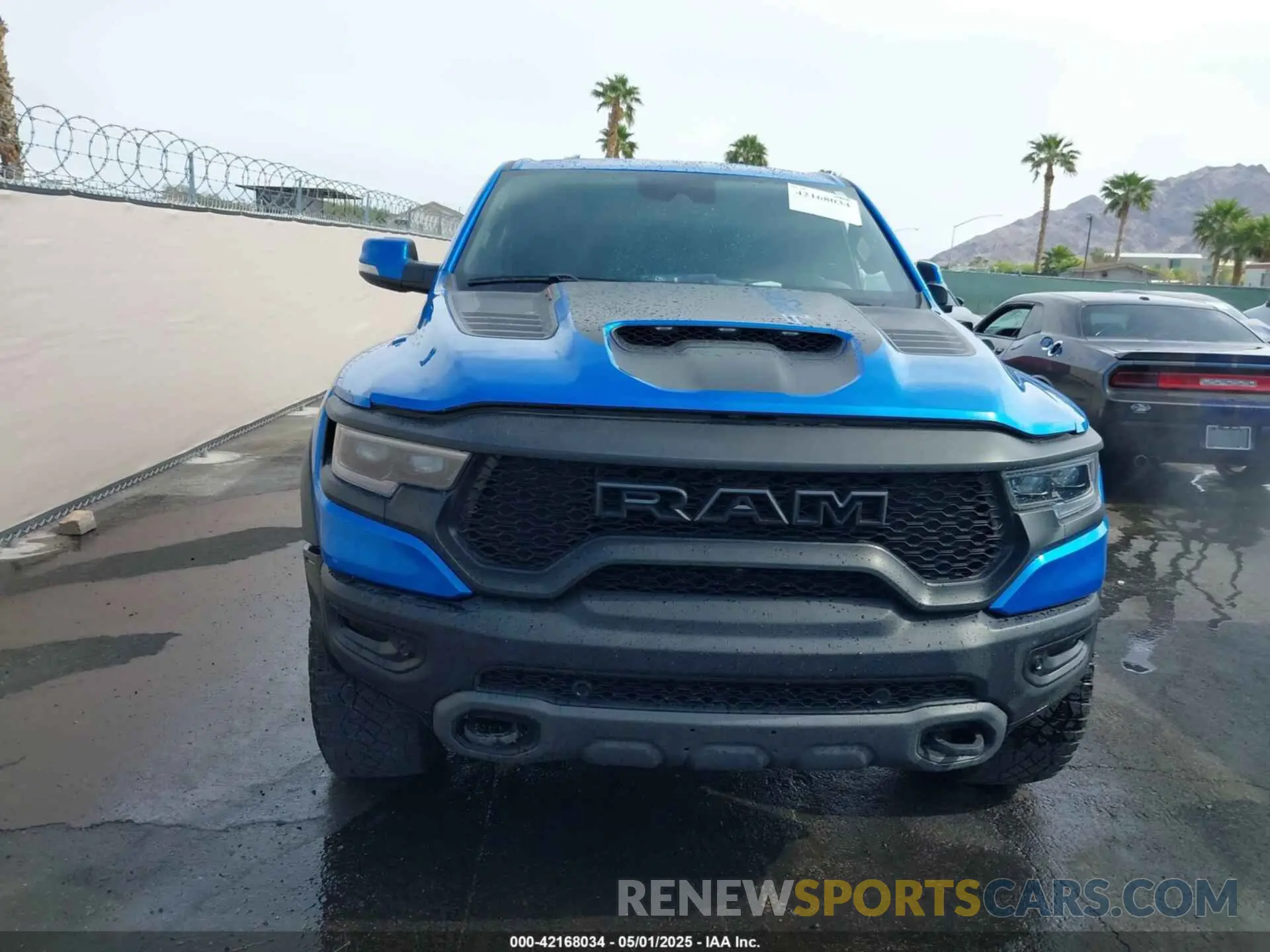 12 Photograph of a damaged car 1C6SRFU94MN705006 RAM 1500 2021