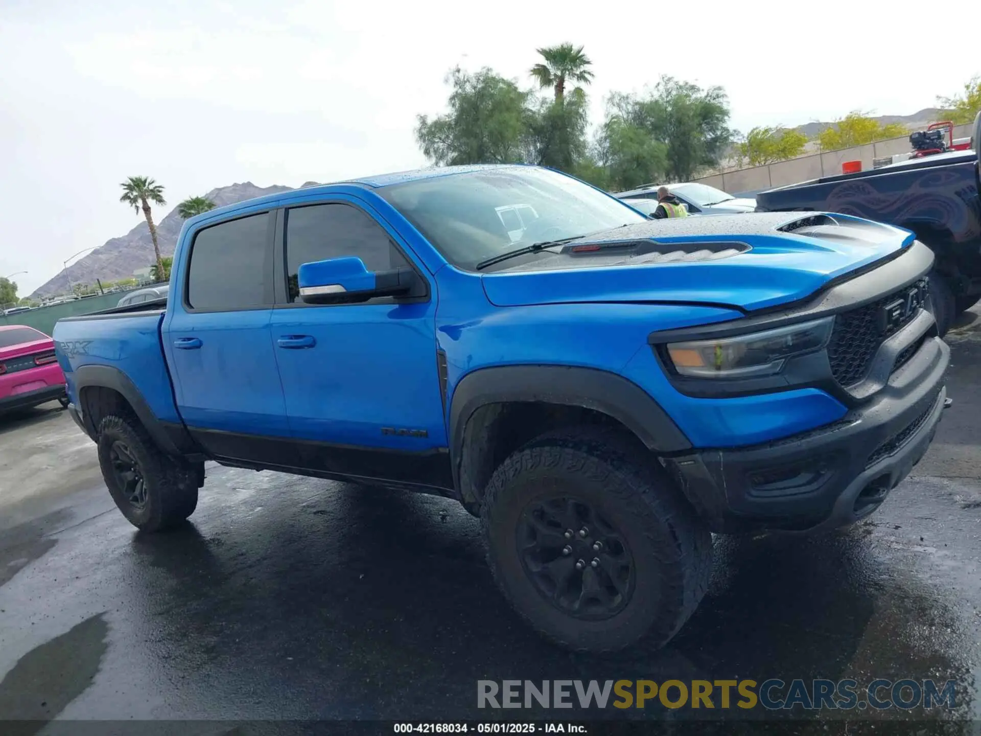 13 Photograph of a damaged car 1C6SRFU94MN705006 RAM 1500 2021