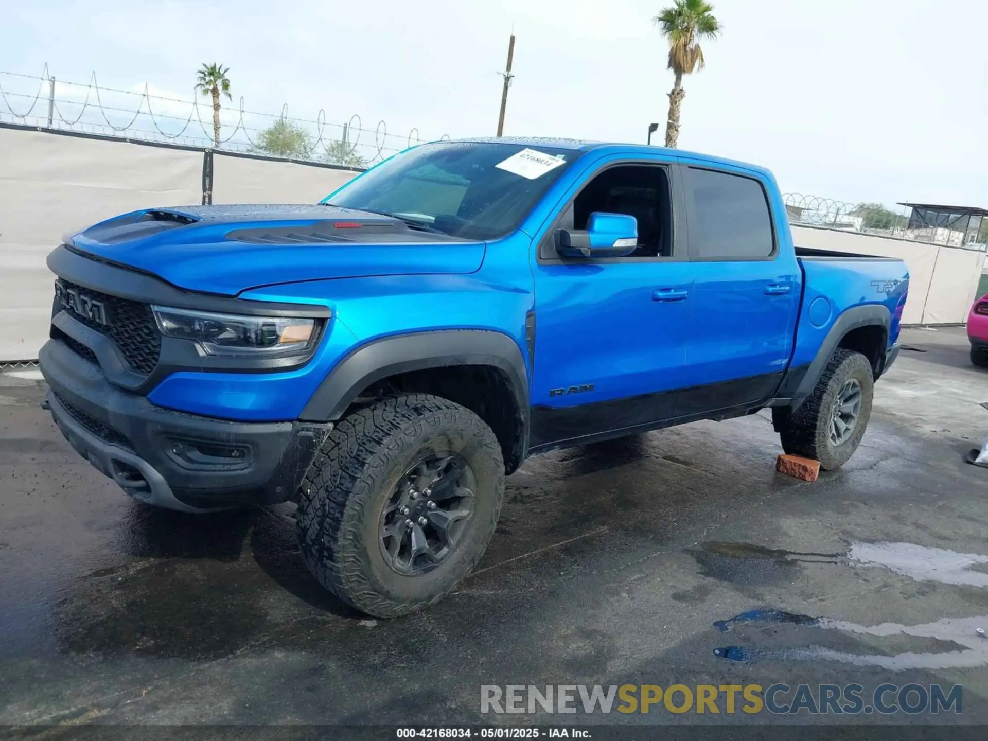 14 Photograph of a damaged car 1C6SRFU94MN705006 RAM 1500 2021