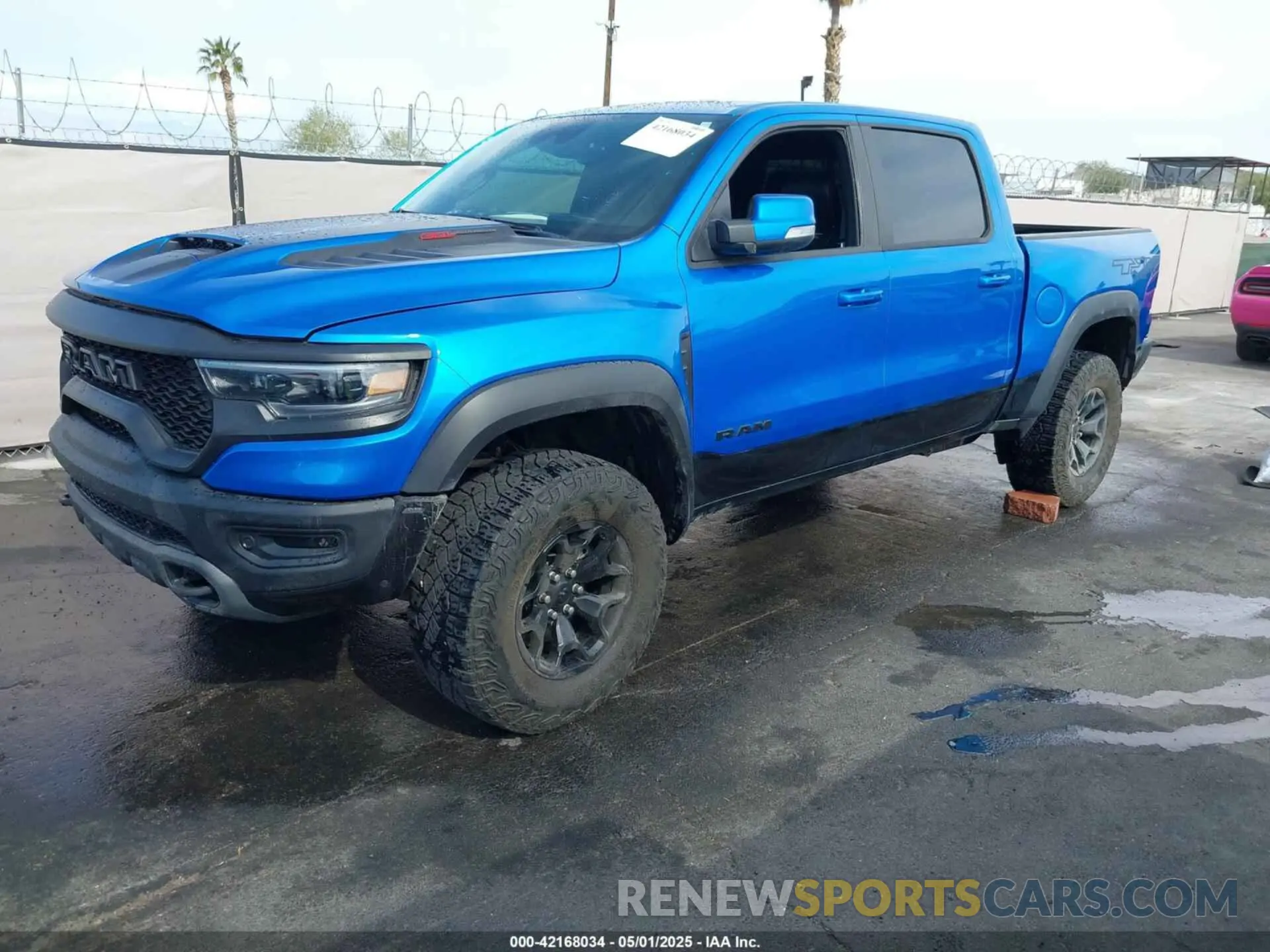 2 Photograph of a damaged car 1C6SRFU94MN705006 RAM 1500 2021