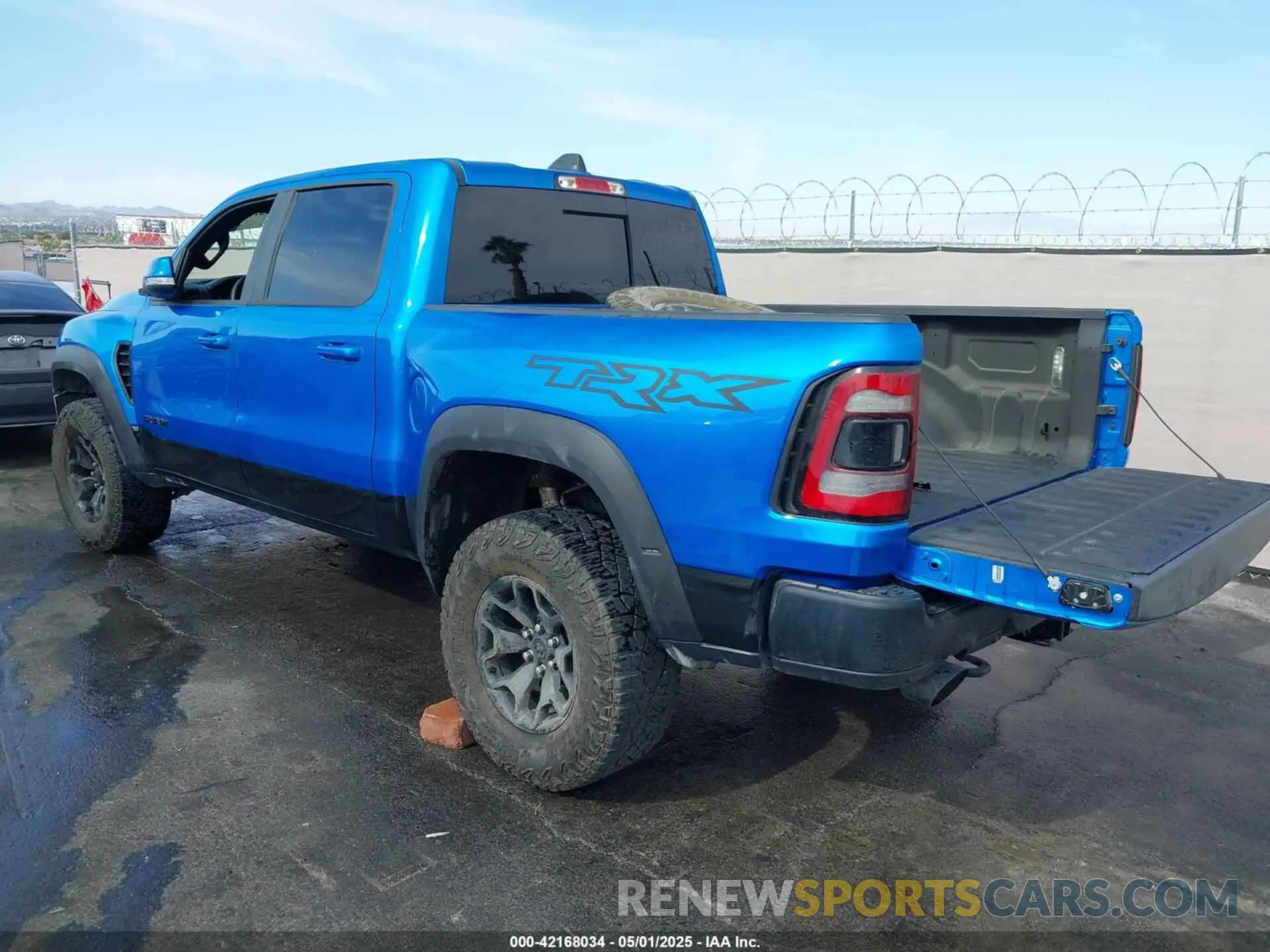 3 Photograph of a damaged car 1C6SRFU94MN705006 RAM 1500 2021