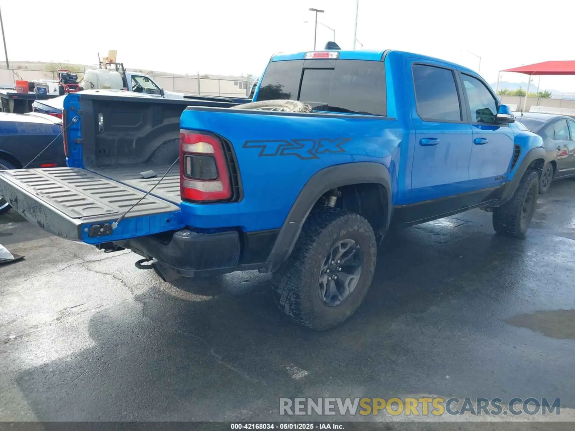 4 Photograph of a damaged car 1C6SRFU94MN705006 RAM 1500 2021