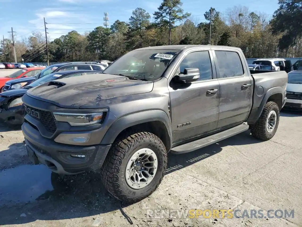 1 Photograph of a damaged car 1C6SRFU94MN757767 RAM 1500 2021