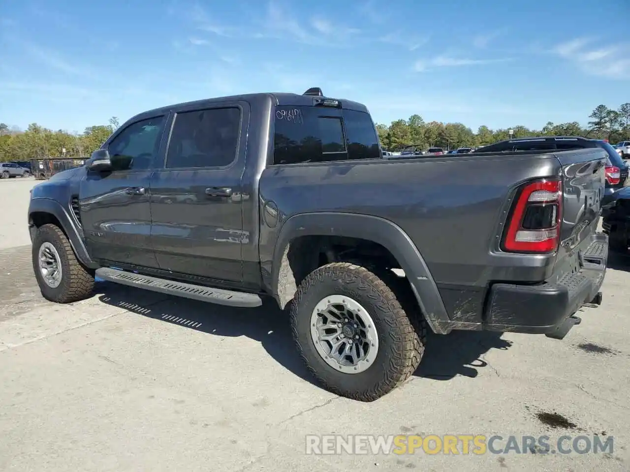 2 Photograph of a damaged car 1C6SRFU94MN757767 RAM 1500 2021