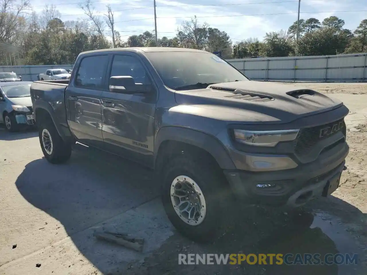 4 Photograph of a damaged car 1C6SRFU94MN757767 RAM 1500 2021