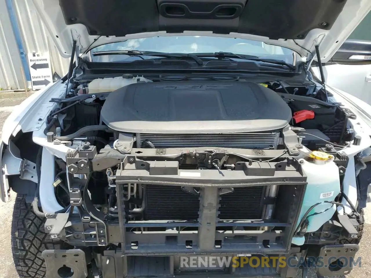 11 Photograph of a damaged car 1C6SRFU94MN762094 RAM 1500 2021