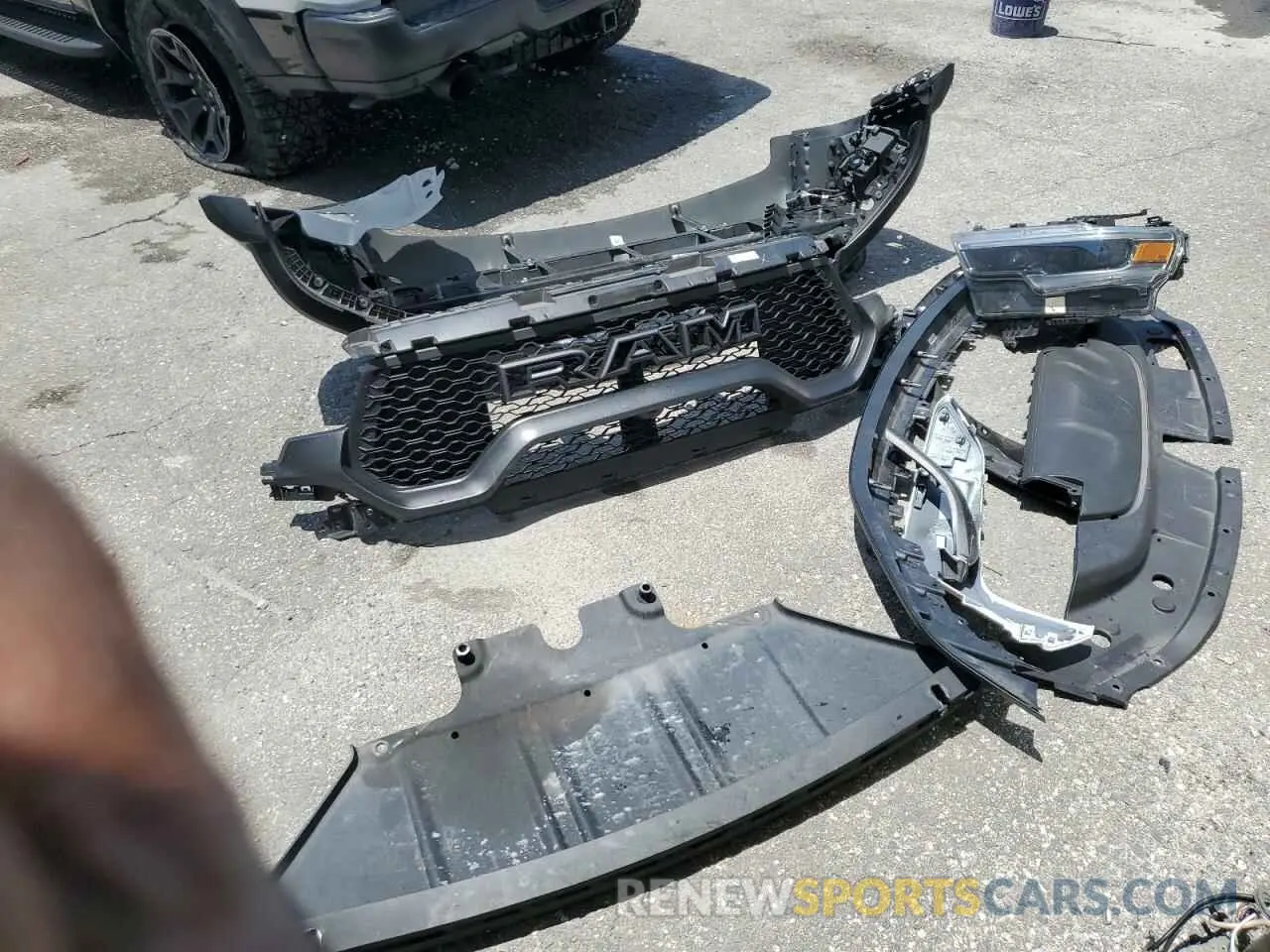 12 Photograph of a damaged car 1C6SRFU94MN762094 RAM 1500 2021