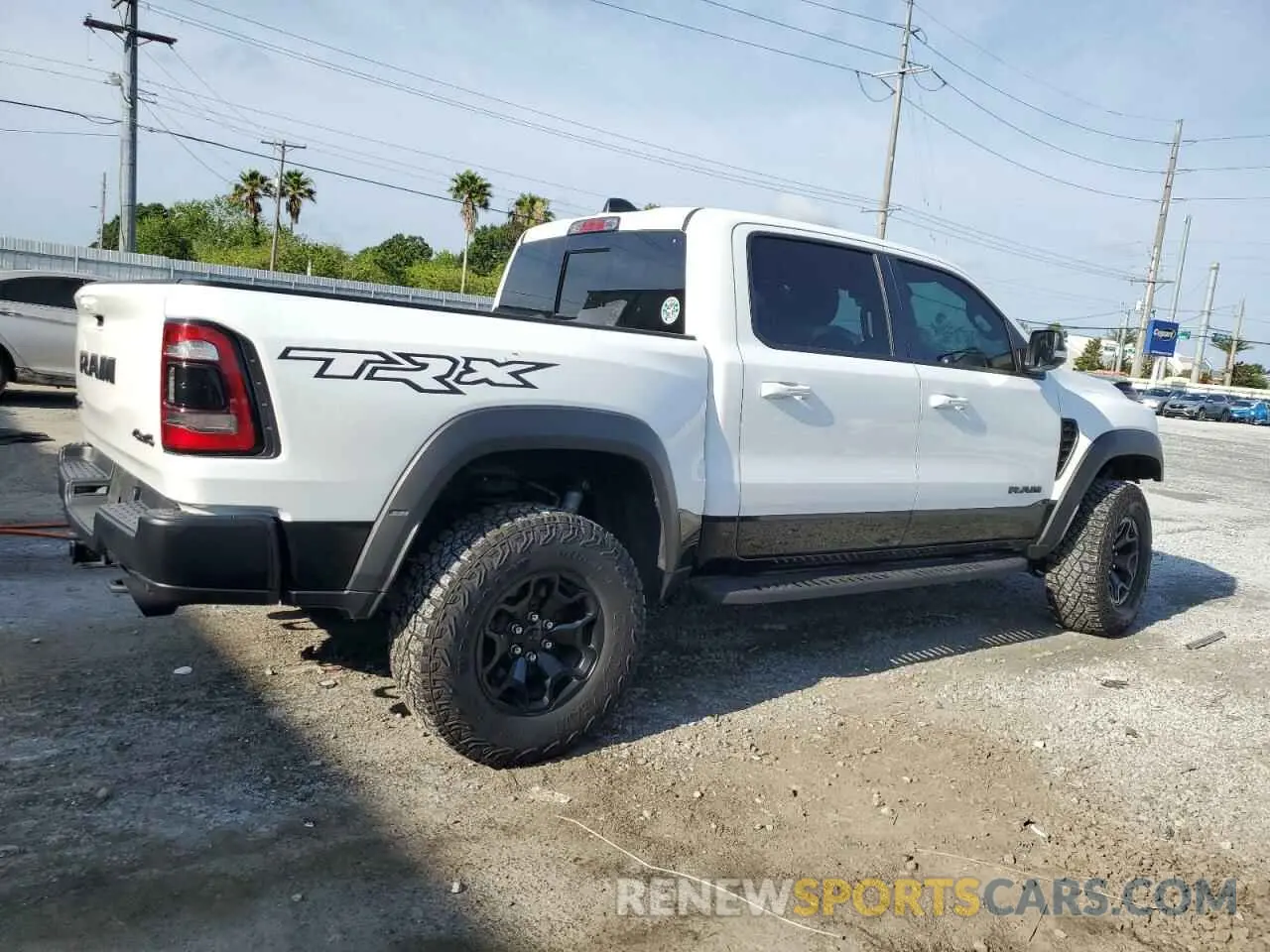 3 Photograph of a damaged car 1C6SRFU94MN762094 RAM 1500 2021