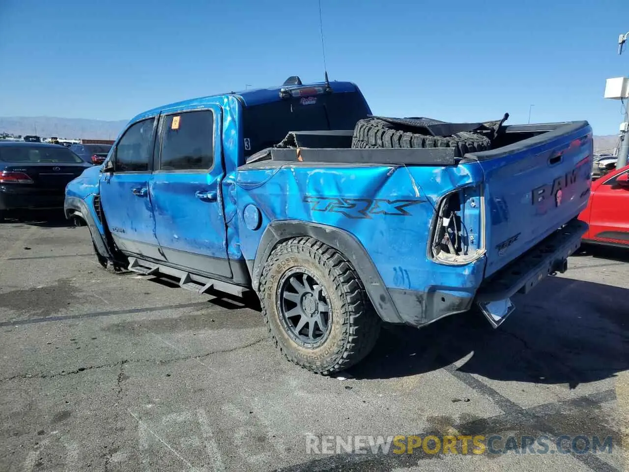 2 Photograph of a damaged car 1C6SRFU94MN783236 RAM 1500 2021