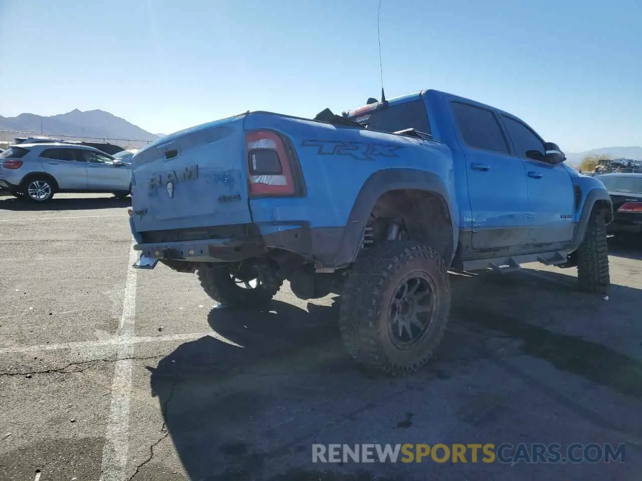 3 Photograph of a damaged car 1C6SRFU94MN783236 RAM 1500 2021