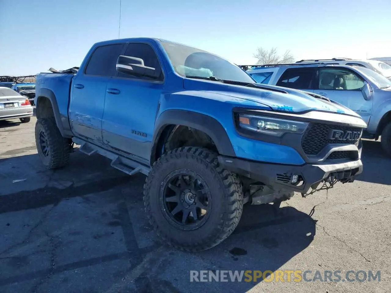 4 Photograph of a damaged car 1C6SRFU94MN783236 RAM 1500 2021