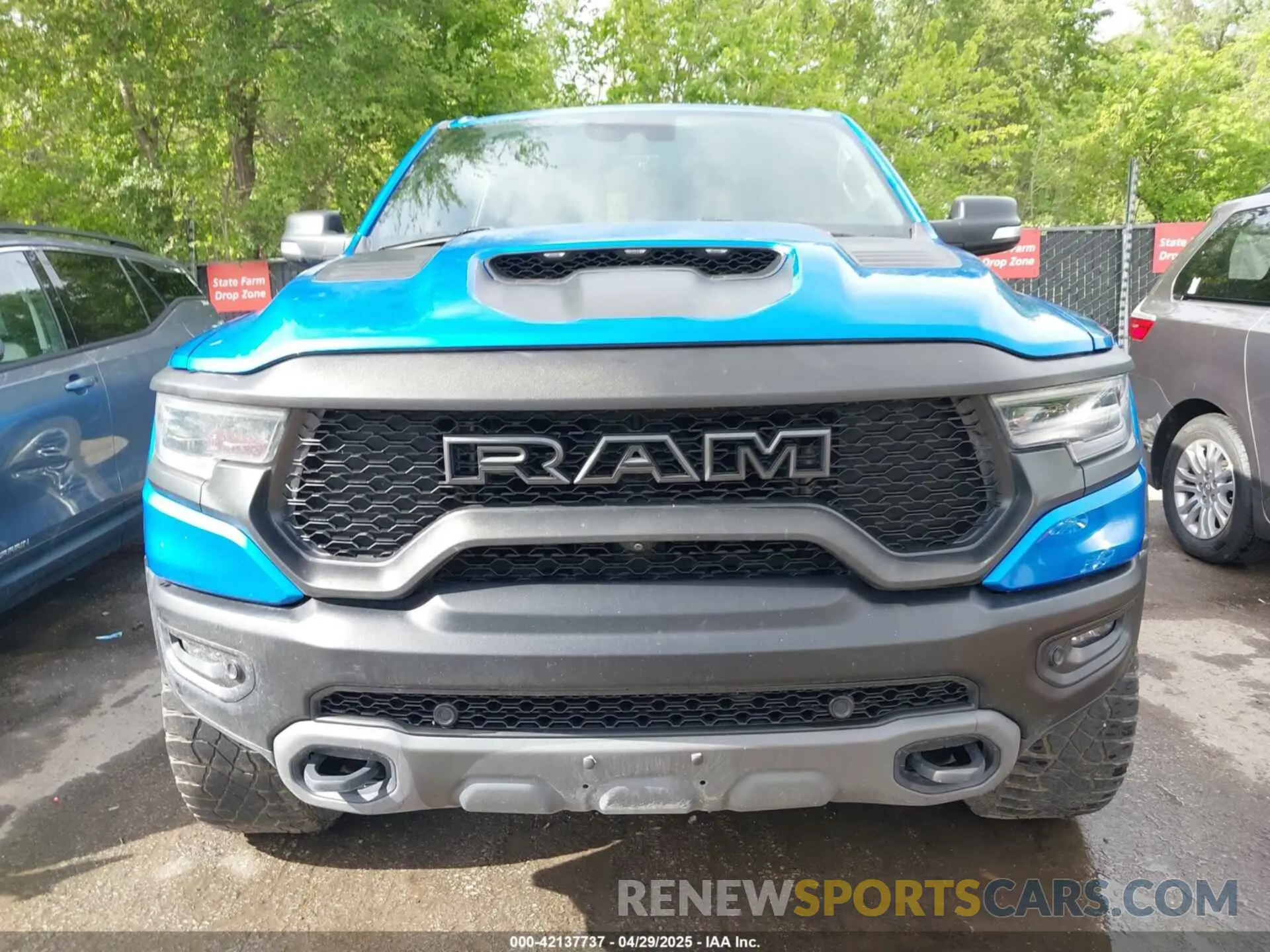 13 Photograph of a damaged car 1C6SRFU94MN812802 RAM 1500 2021