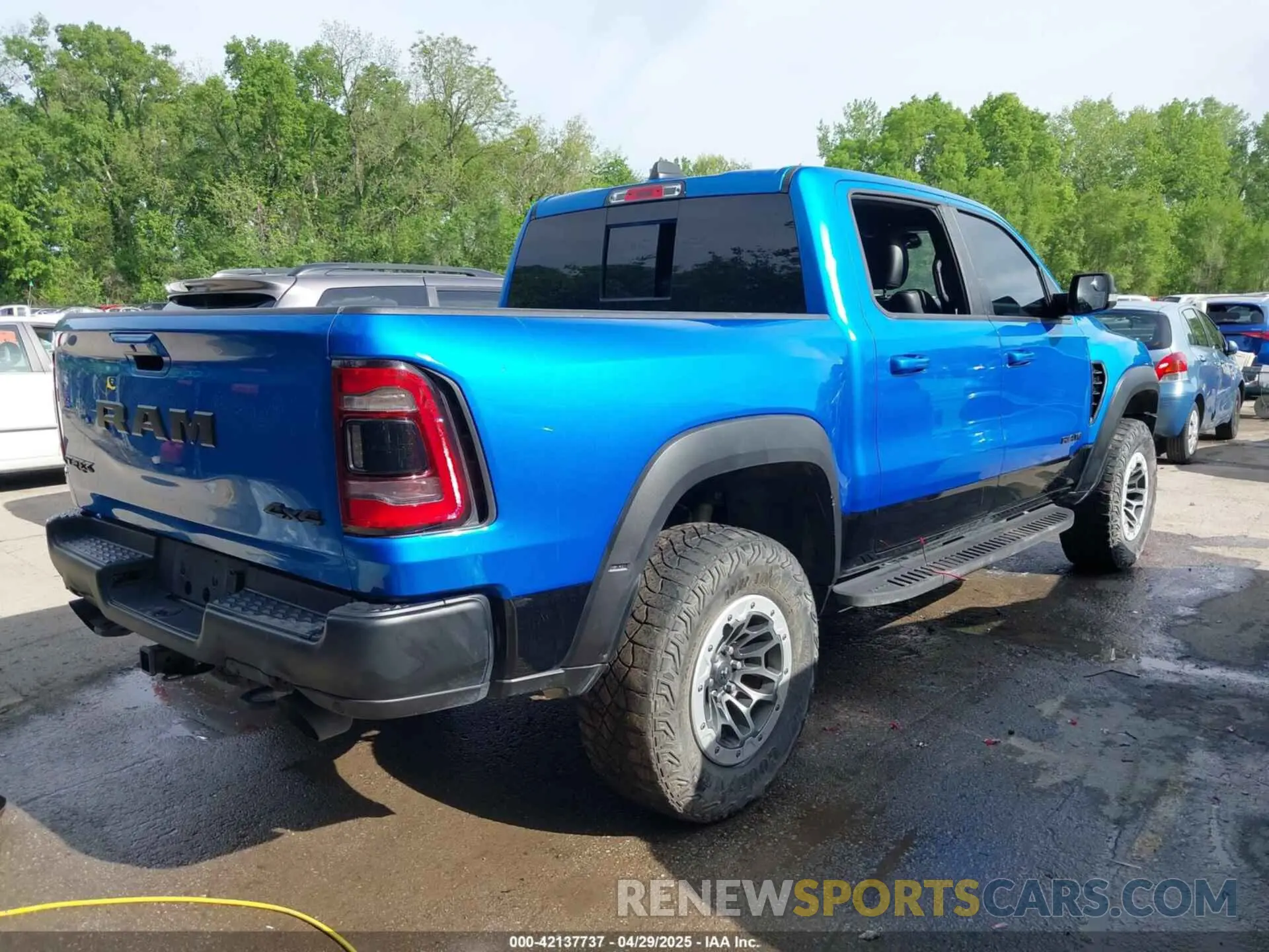 4 Photograph of a damaged car 1C6SRFU94MN812802 RAM 1500 2021