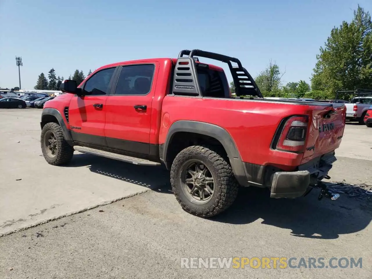 2 Photograph of a damaged car 1C6SRFU94MN903410 RAM 1500 2021