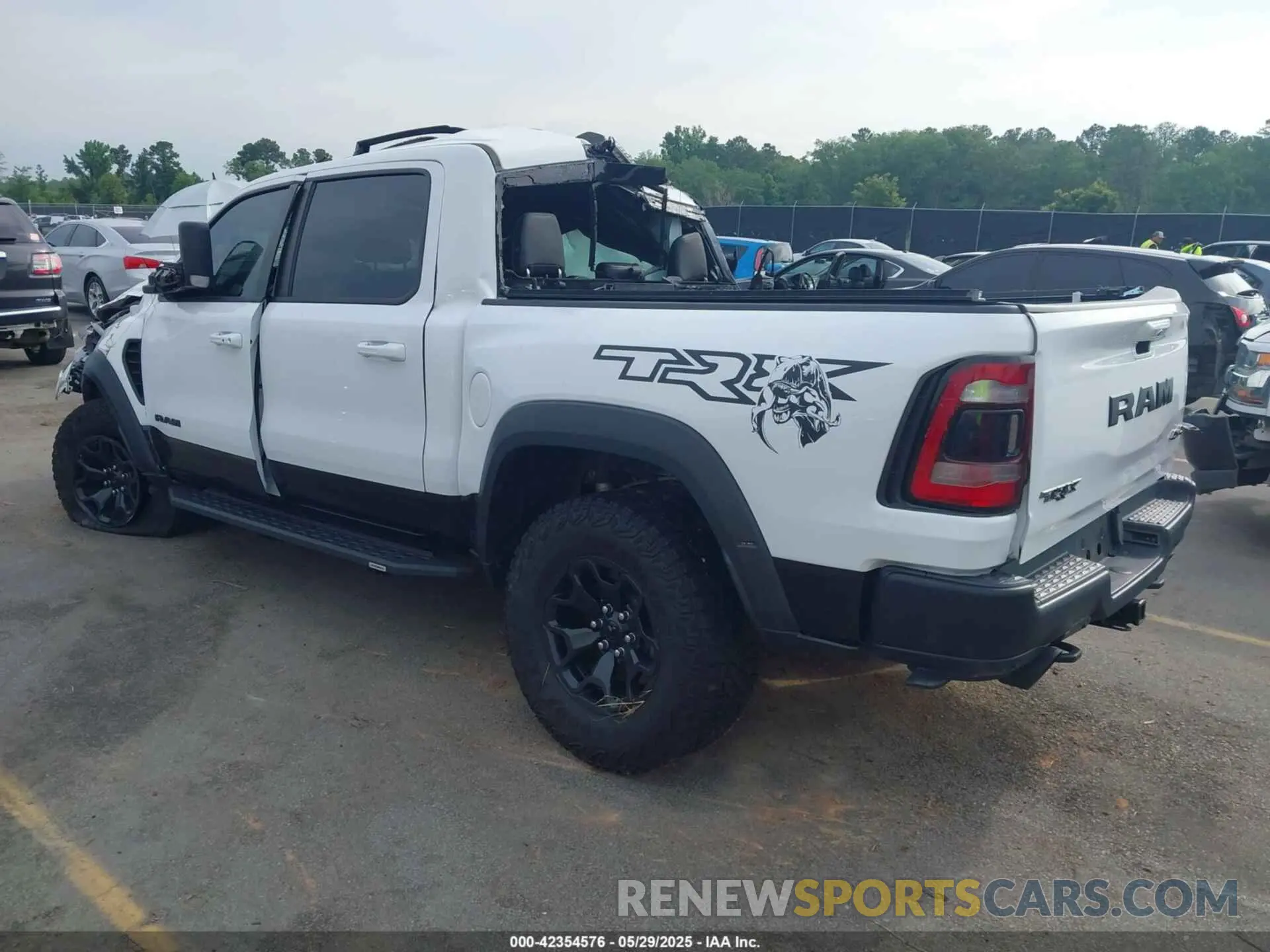 3 Photograph of a damaged car 1C6SRFU95MN904579 RAM 1500 2021