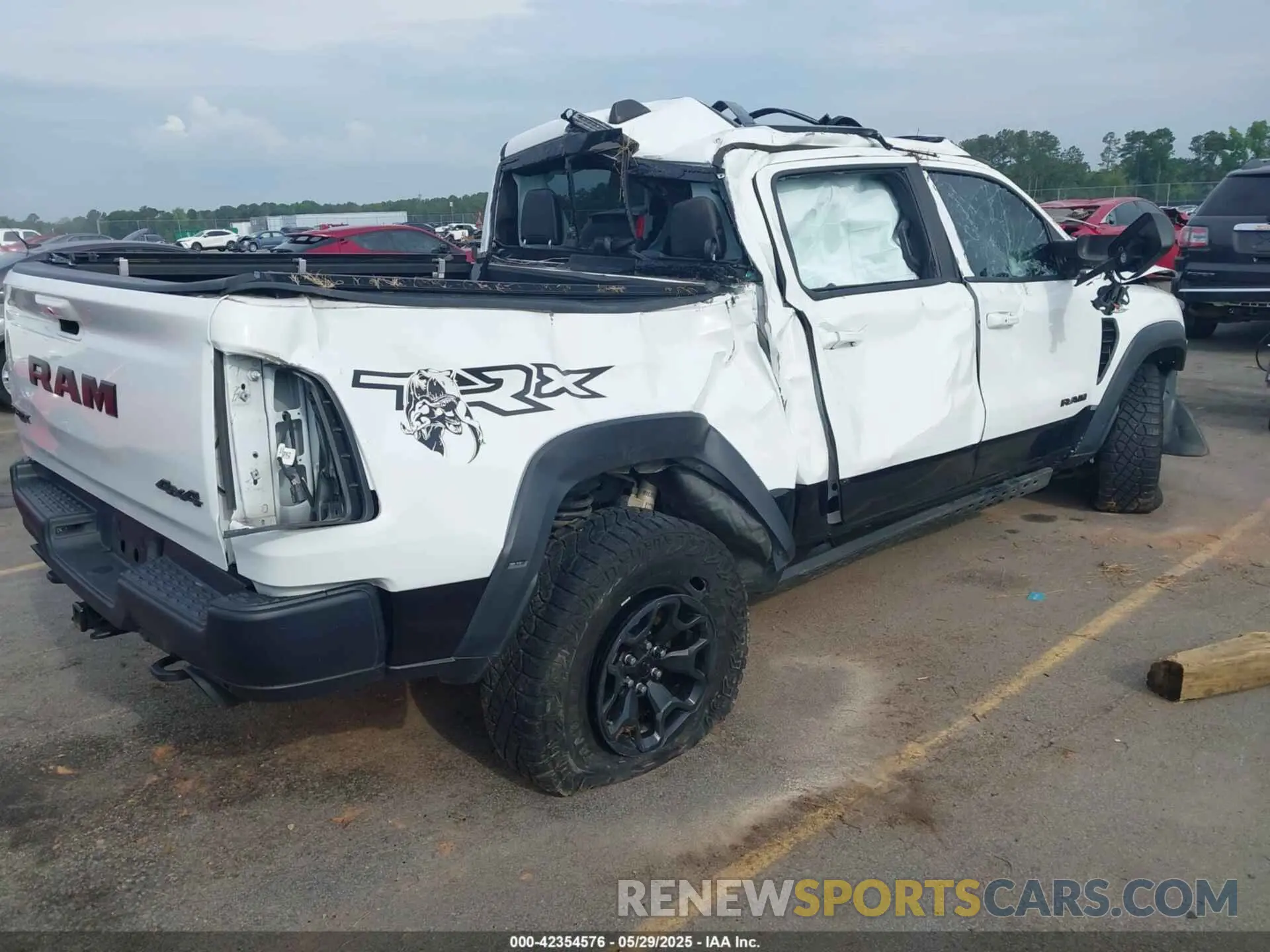 4 Photograph of a damaged car 1C6SRFU95MN904579 RAM 1500 2021