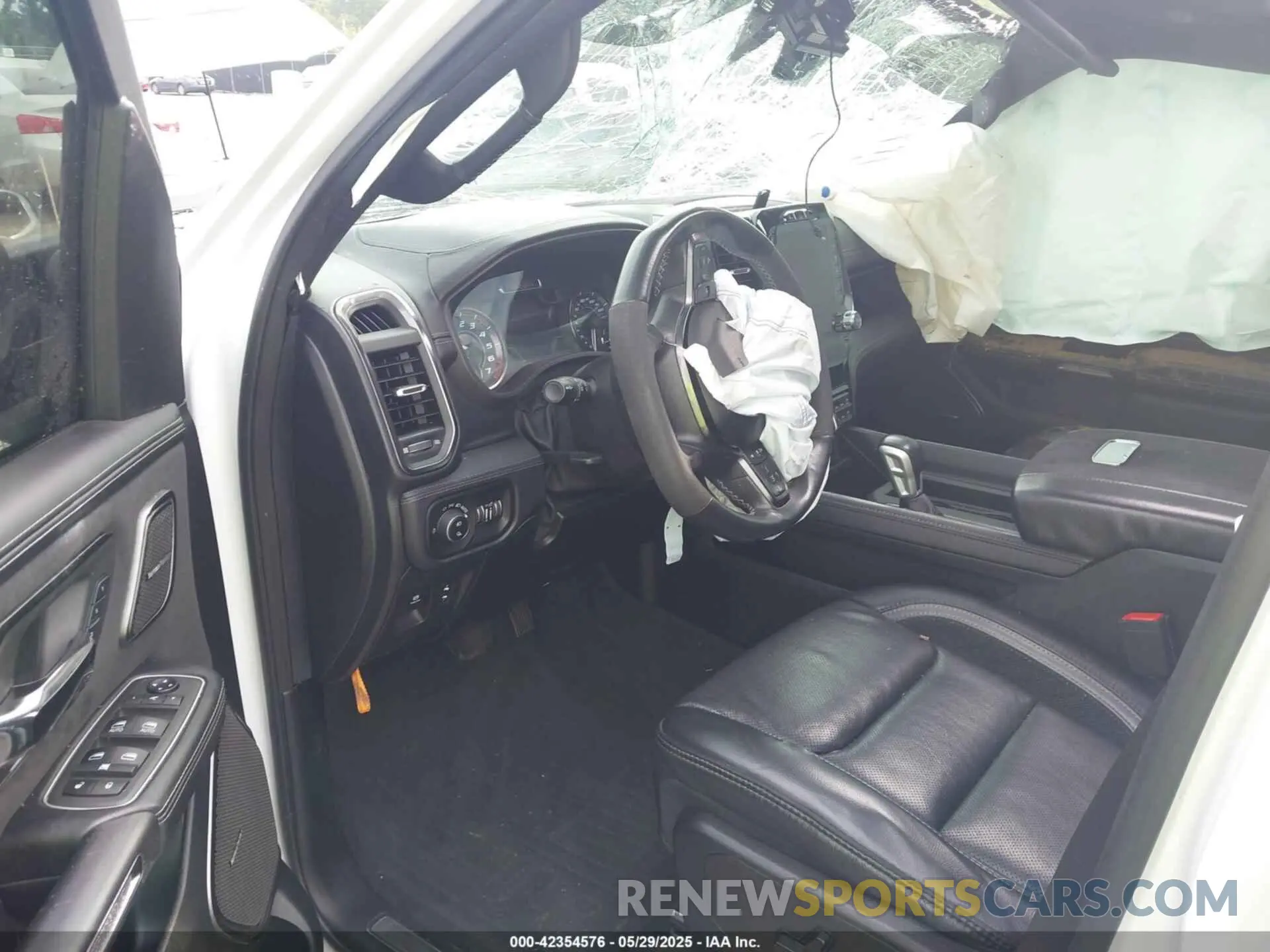 5 Photograph of a damaged car 1C6SRFU95MN904579 RAM 1500 2021