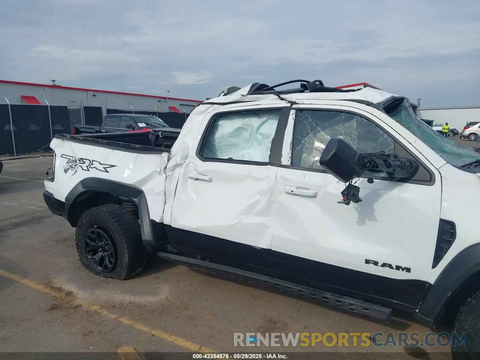 6 Photograph of a damaged car 1C6SRFU95MN904579 RAM 1500 2021