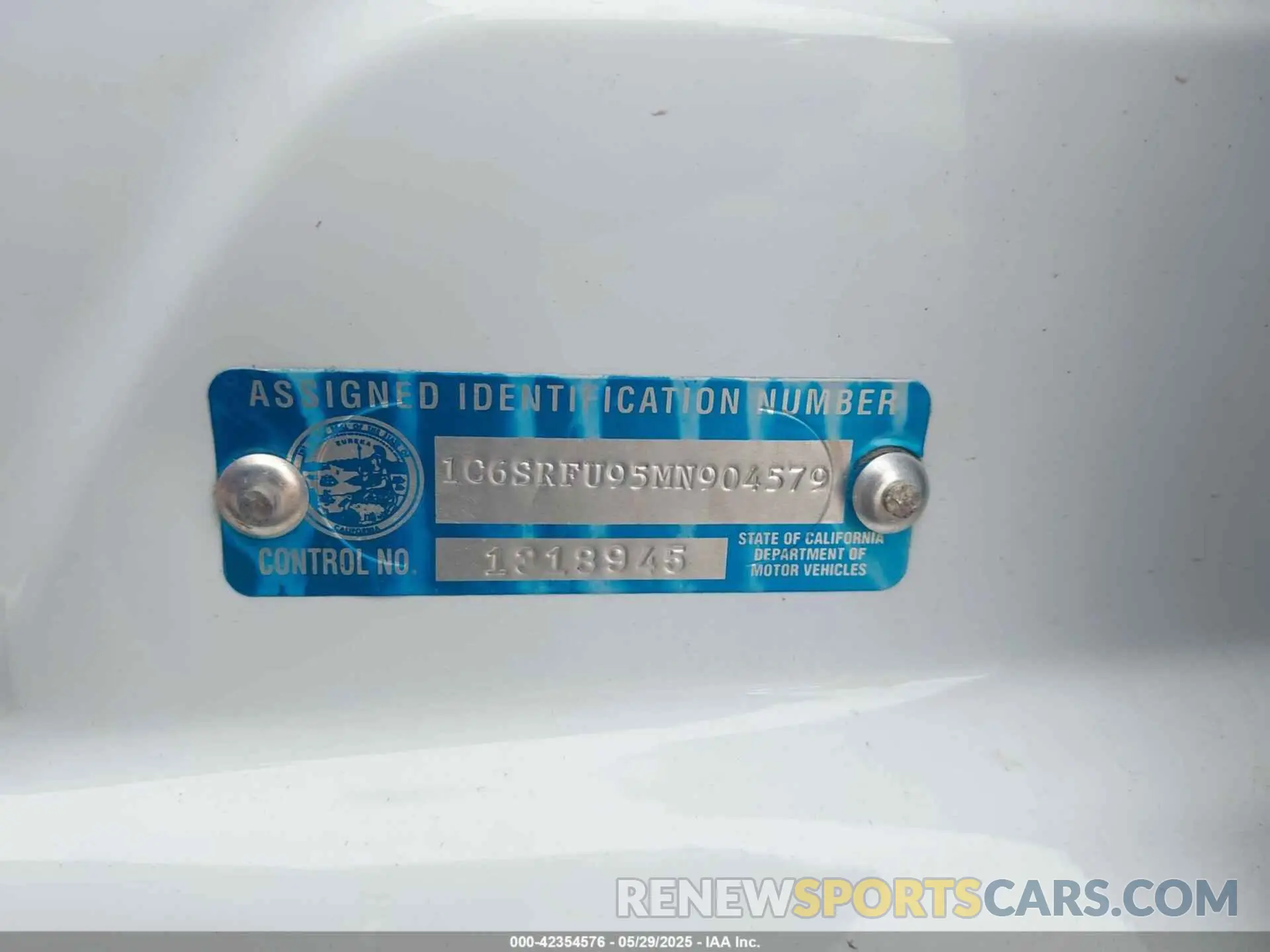 9 Photograph of a damaged car 1C6SRFU95MN904579 RAM 1500 2021