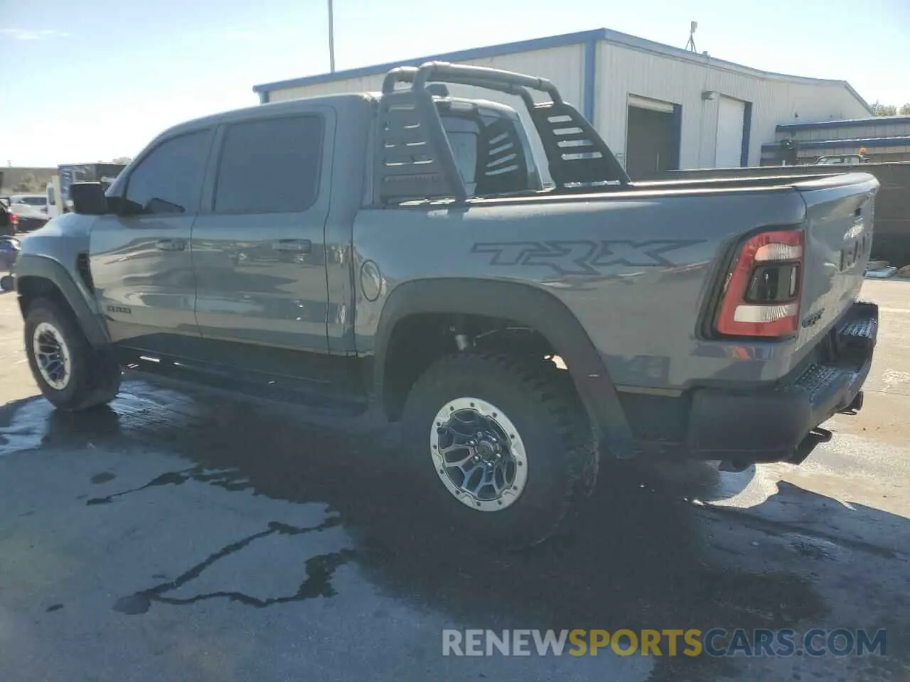2 Photograph of a damaged car 1C6SRFU96MN903103 RAM 1500 2021