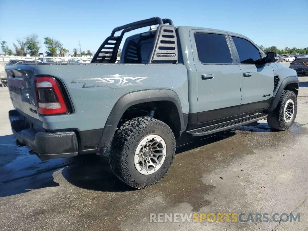 3 Photograph of a damaged car 1C6SRFU96MN903103 RAM 1500 2021