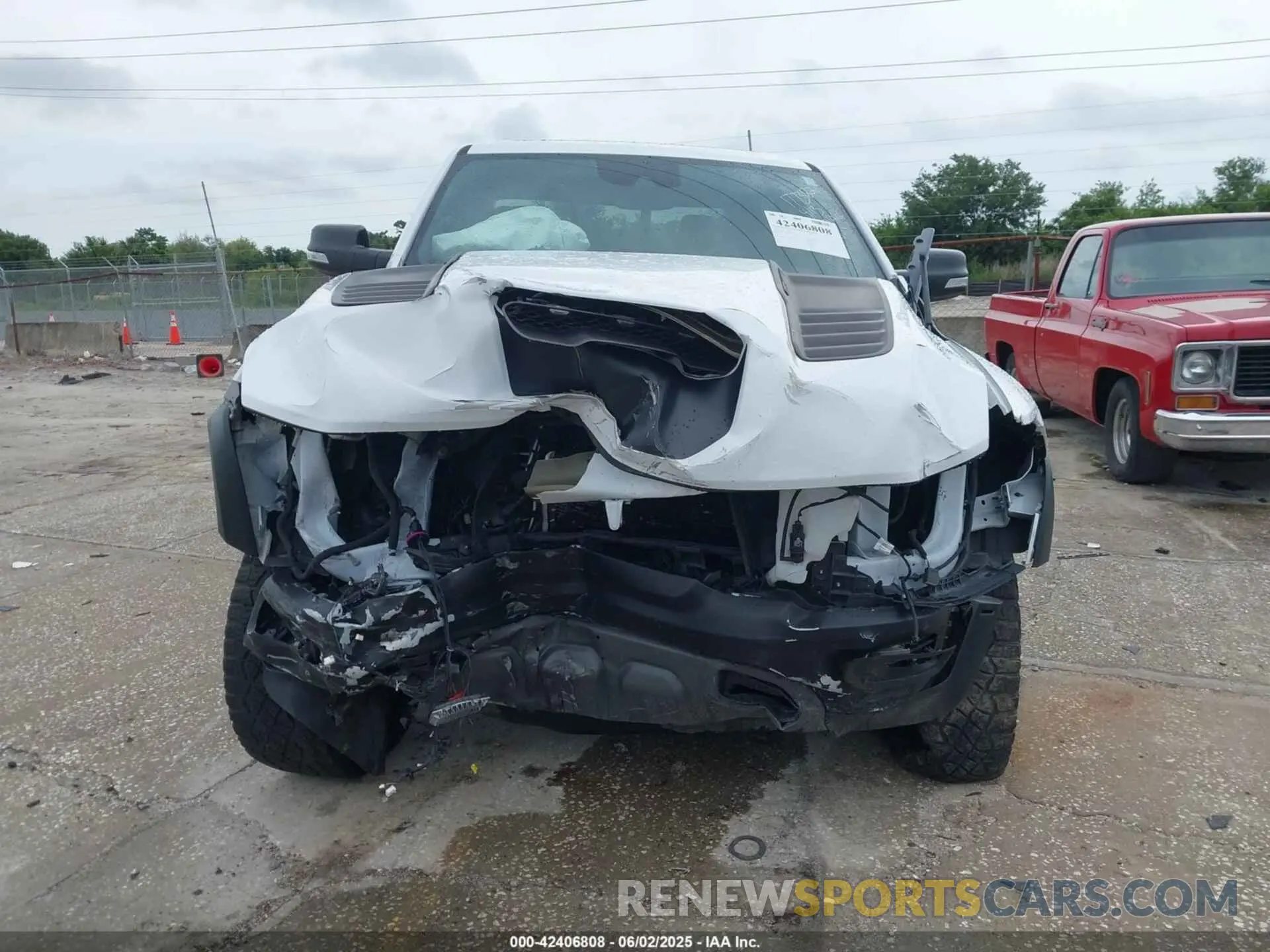 12 Photograph of a damaged car 1C6SRFU97MN719899 RAM 1500 2021